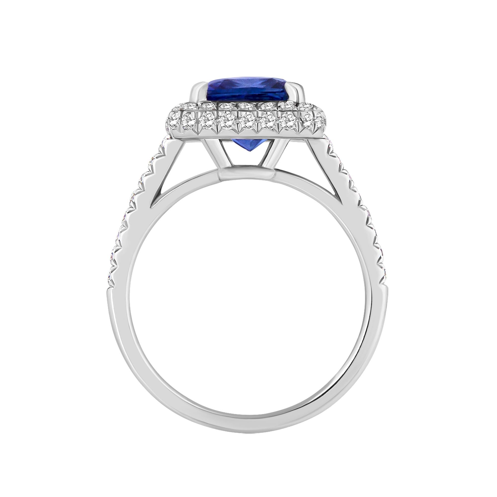 This beautiful Diamond Sapphire ring was crafted in luxurious Platinum. This ring is adorned with a baby blue Color; A 3.36 Carat ceylon Sapphire set in the cetner Measuring approx 8.25x8.10mm. The ring is handmade with each diamond being pave set 