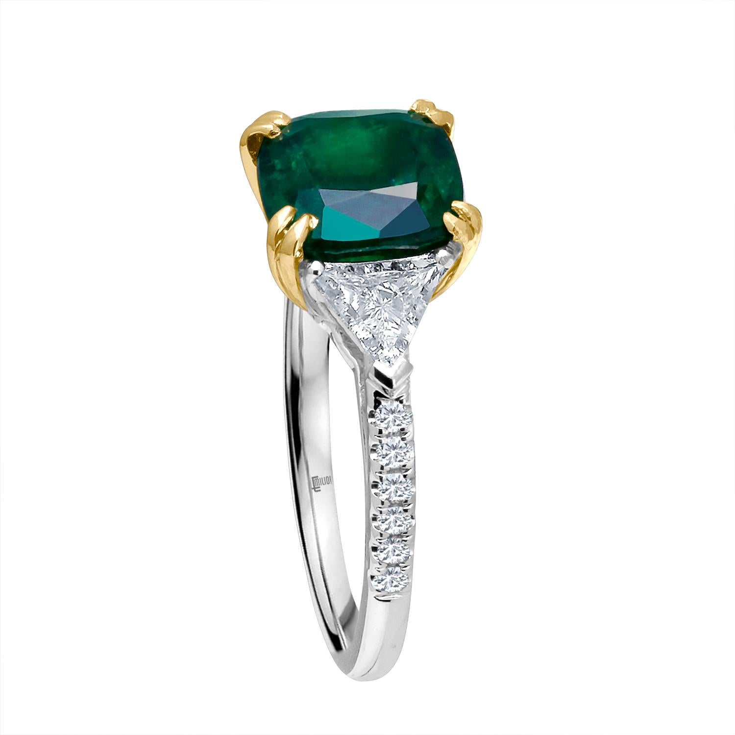Hand made in the Emilio Jewelry Factory, A gorgeous deep green Certified Emerald cut Zambian Genuine Emerald 3.63 Carats set in the center. The emerald is very clean and completely eye clean. Center Emerald Dimensions: 8.90x8.90mm
The Side diamonds