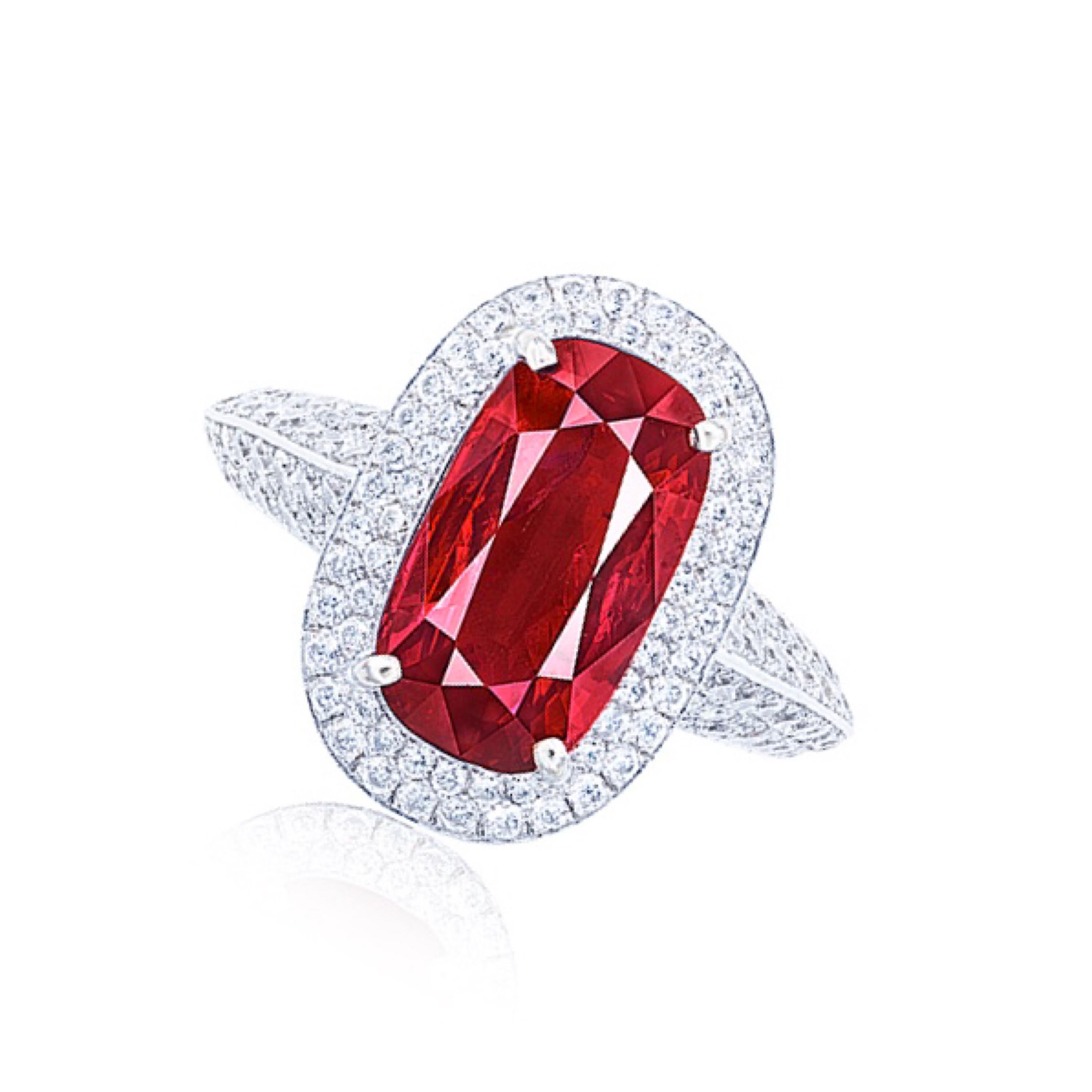 Showcasing a certified no heat Mozambique Ruby weighing 4 carats, of gorgeous rich red color. 
This piece was Hand made in the Emilio Jewelry Atelier, whom specializes in rare collectible pieces in the Fancy colored diamond, and precious stone