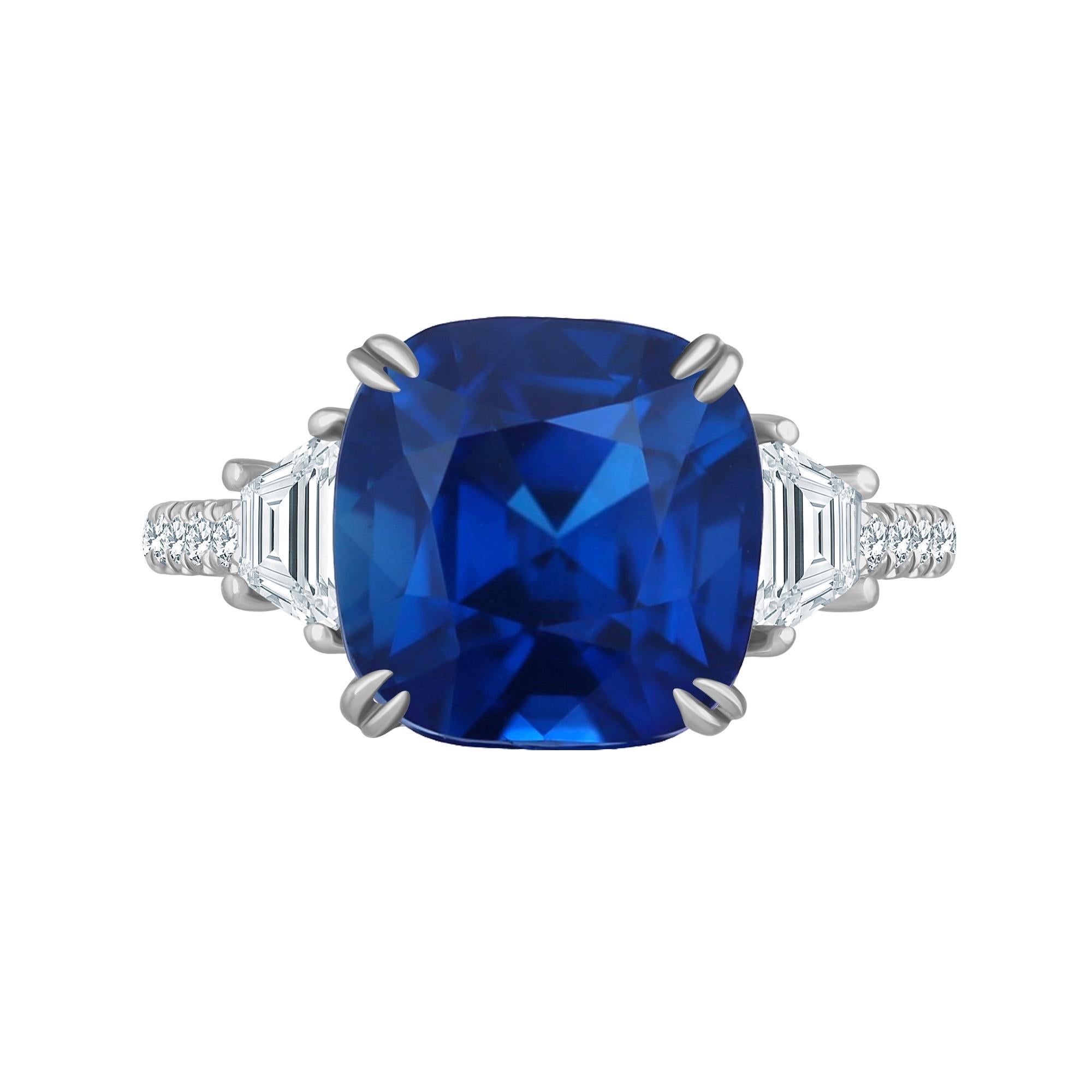 From the vault at Emilio Jewelry New York,
Hand made in platinum, showcasing a magnificent sapphire stated color as Royal Blue on the certificate. Please inquire for details! Total weight shown in title. 