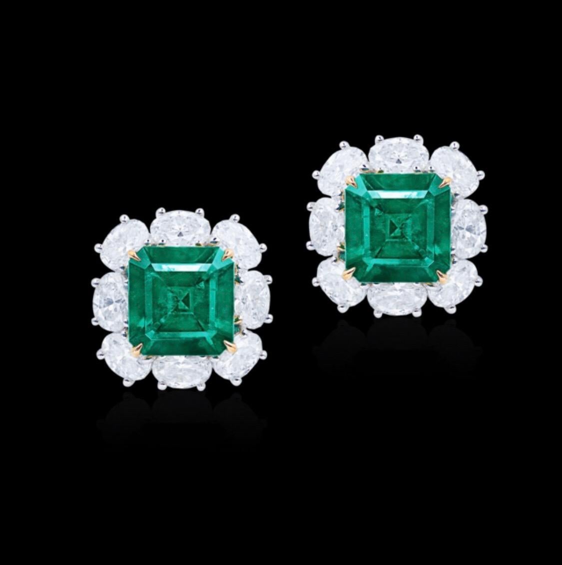From the Emilio Jewelry Museum Vault, We are Showcasing a stunning pair of 6.00 carat total weight untreated no oil emerald earrings. The diamonds are exceptional and clean. No oil Colombian vivid green Muzo emeralds are extremely rare making up for