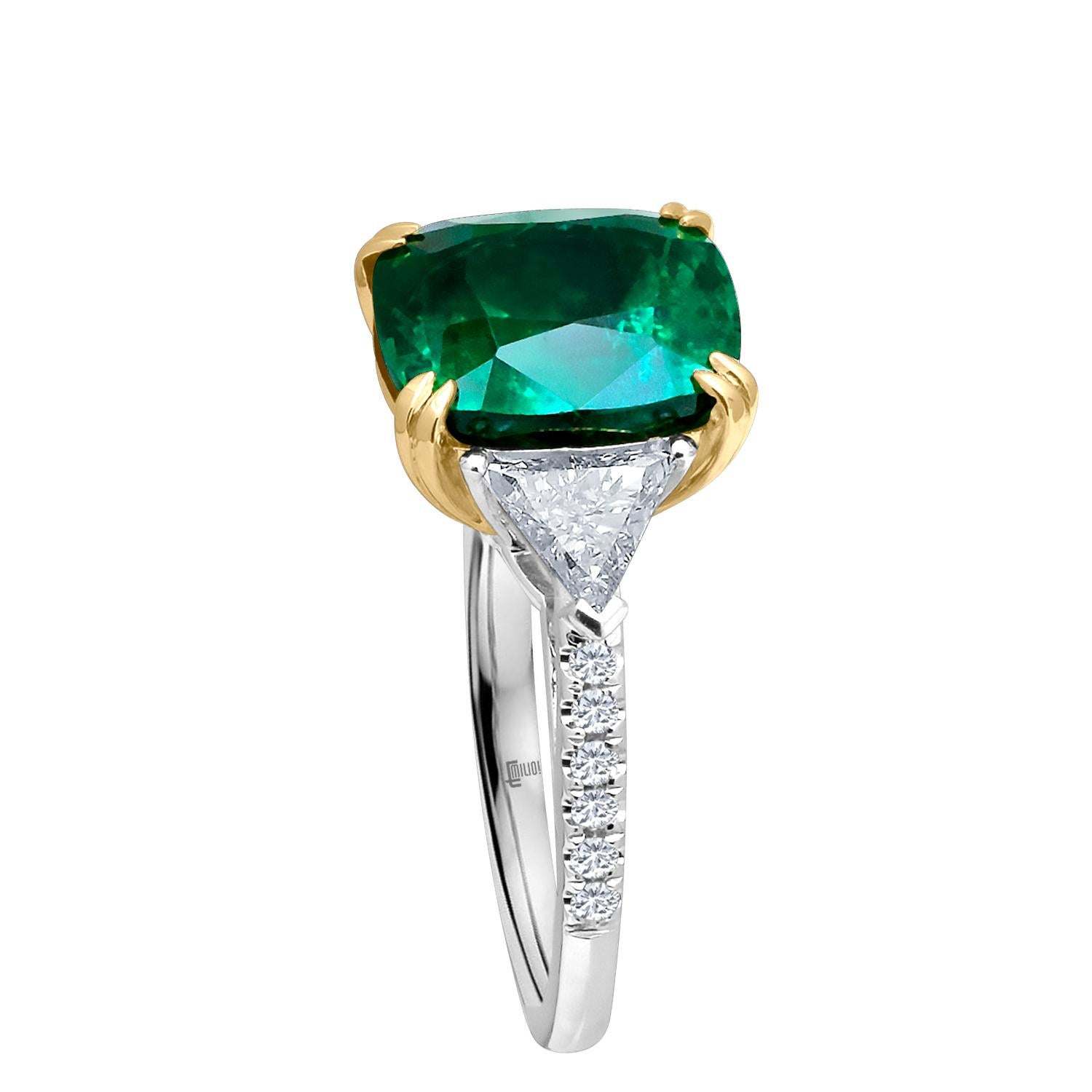 Hand made in the Emilio Jewelry Factory, A gorgeous deep green Certified cushion cut Zambian Genuine Emerald 5.41 Carats set in the center. The emerald is very clean and completely eye clean. Center Emerald Dimensions: 11mm Long 
The Side diamonds