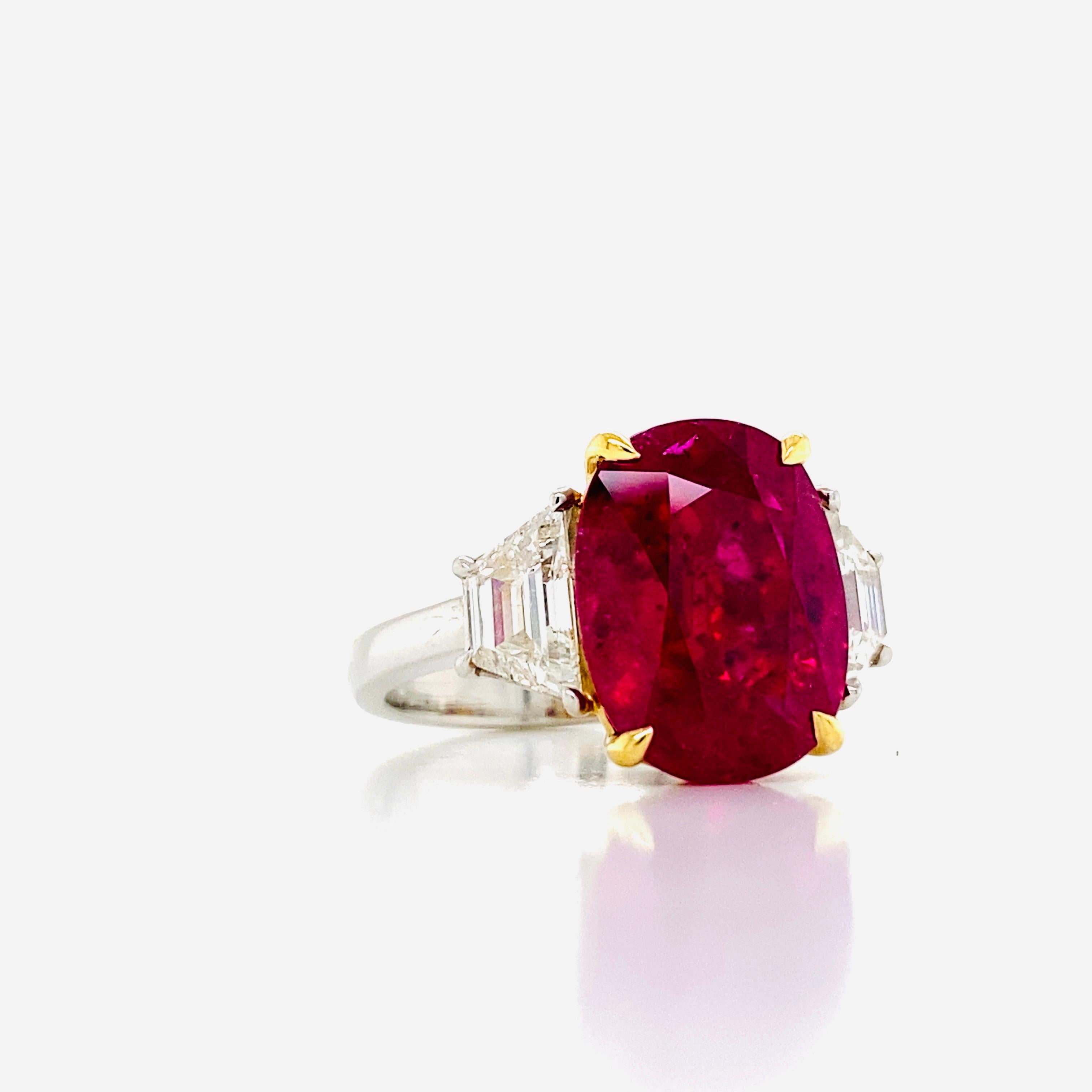 From the Emilio Jewelry Vault, Showcasing a magnificent 7.55 carat natural Ruby set in the center. Gorgeous vibrant natural untreated Thai Ruby. The elongated shape is very rare, the color is just perfect and very vibrant. 
Priced attractively