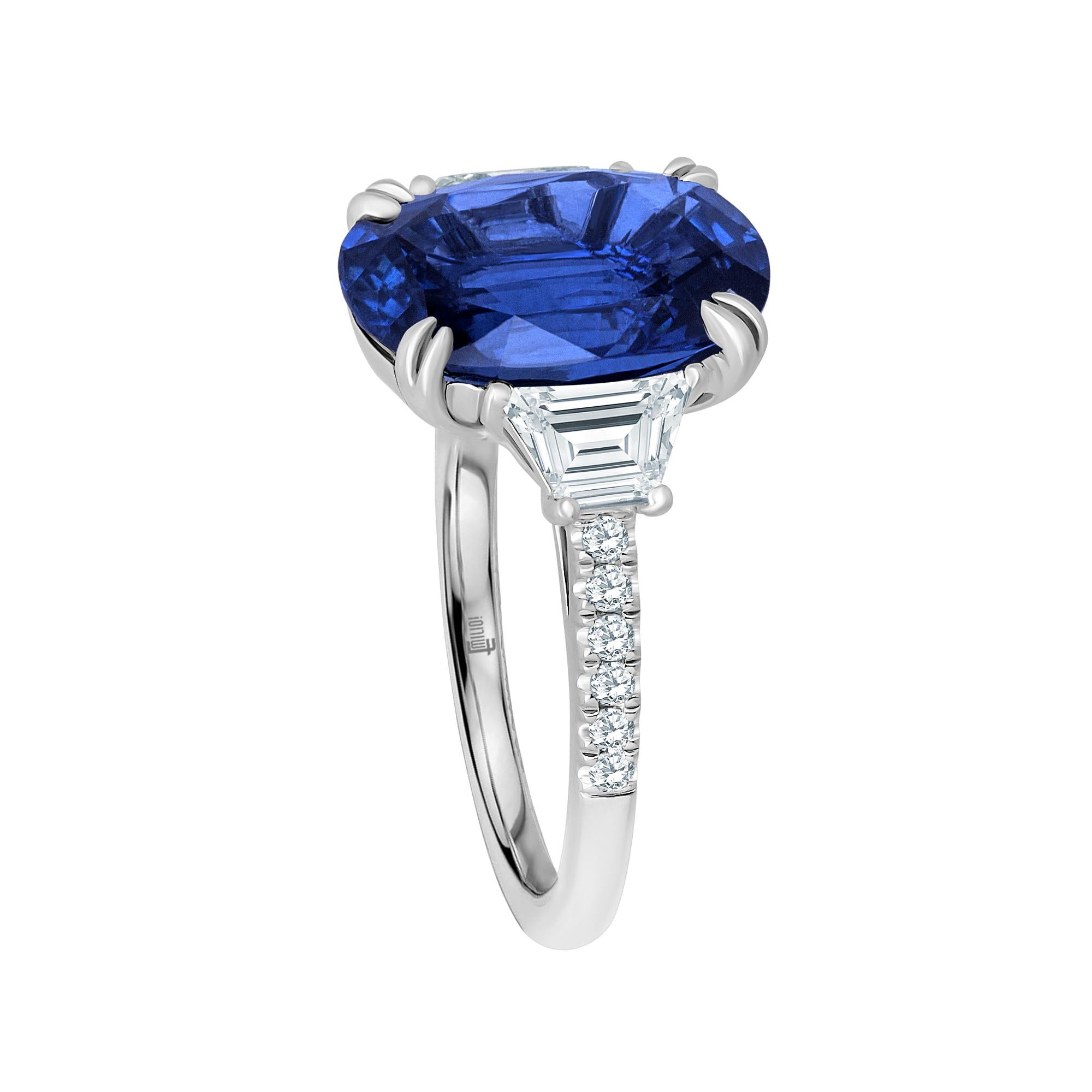 Emilio Jewelry Certified 7.96 Carat Sapphire Diamond Ring 
This amazing ring is unique and well thought out before Emilio designed it! Most women today want a ring that is striking, yet humble enough to wear to perform everyday errands. This ring is