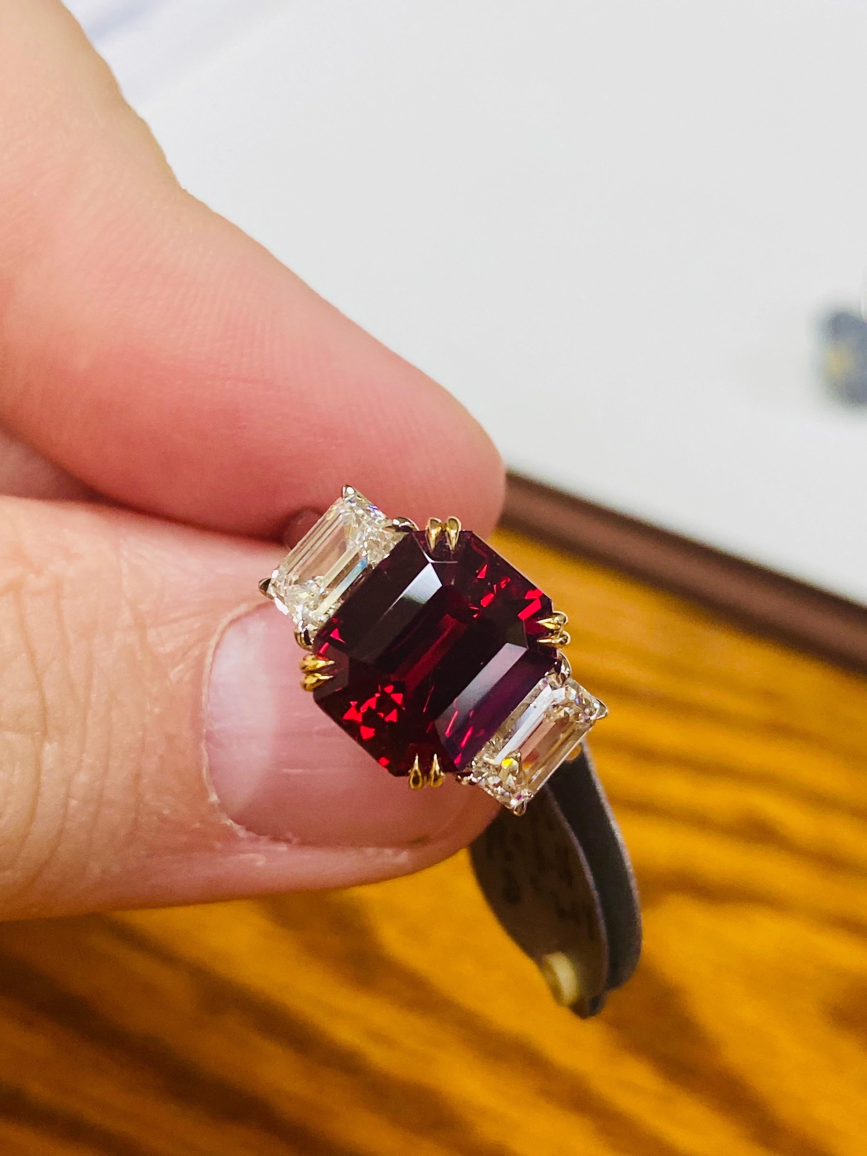 From Emilio Jewelry, a well known and respected wholesaler/dealer located on New York’s iconic Fifth Avenue, 
Showcasing the most spectacular Emerald cut ruby center just over 6.15cts set with an additional 2.00ct of diamonds. We have ever seen such