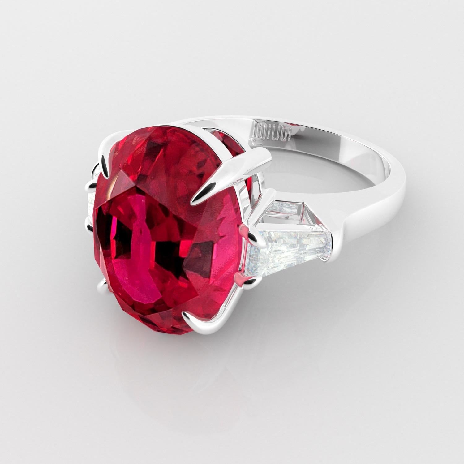 From the museum vault at Emilio Jewelry New York,
A magnificent Mozambique ruby sits in the center of our hand made ring, classified on the certificate as Vivid Red. Please inquire for details and certificate copy. 
