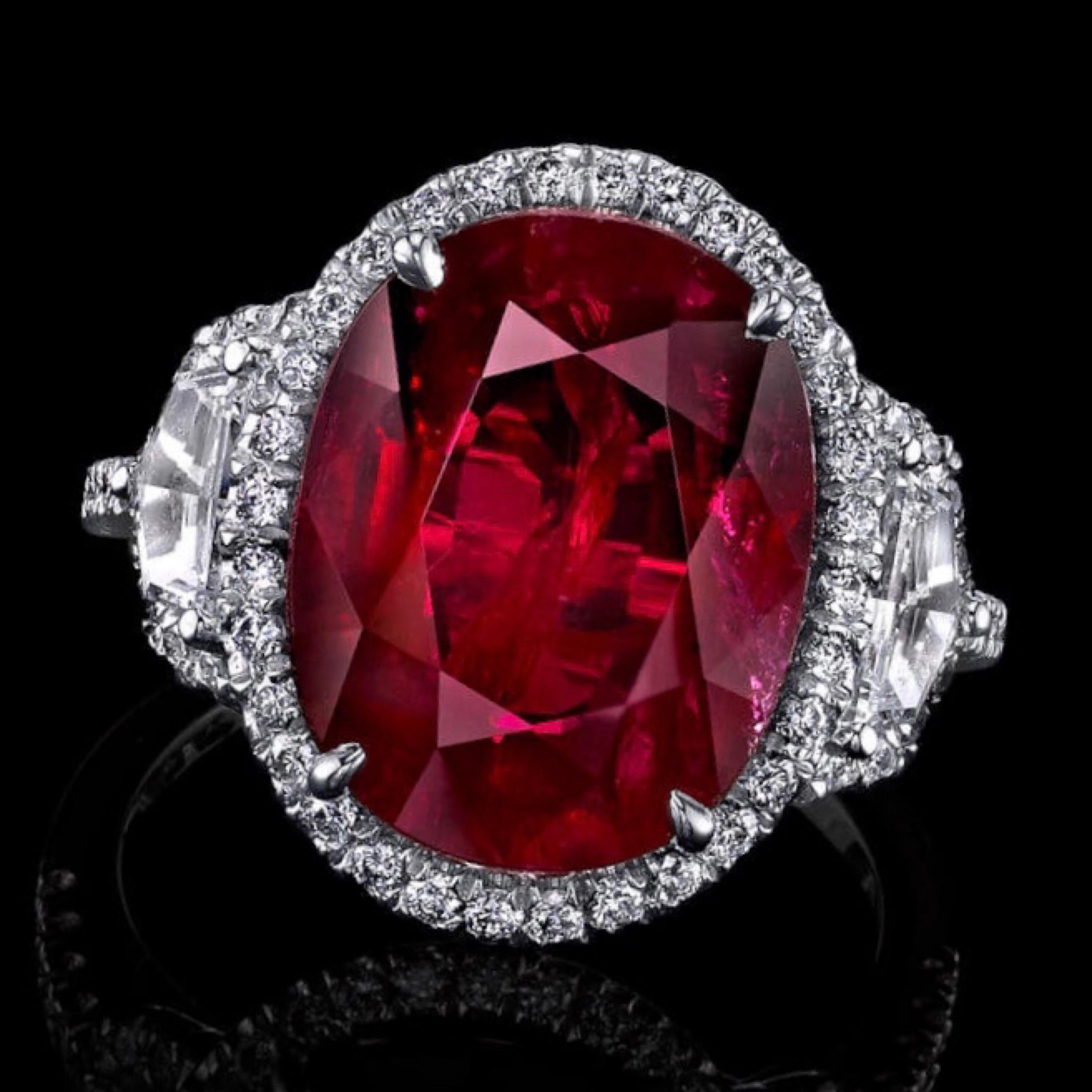 From the Emilio Jewelry Vault, We are Showcasing a certified 8.30ct natural ruby of exceptional color. 
This piece was Hand made in the Emilio Jewelry Atelier, whom specializes in rare collectible pieces in natural Fancy colored diamonds, and the