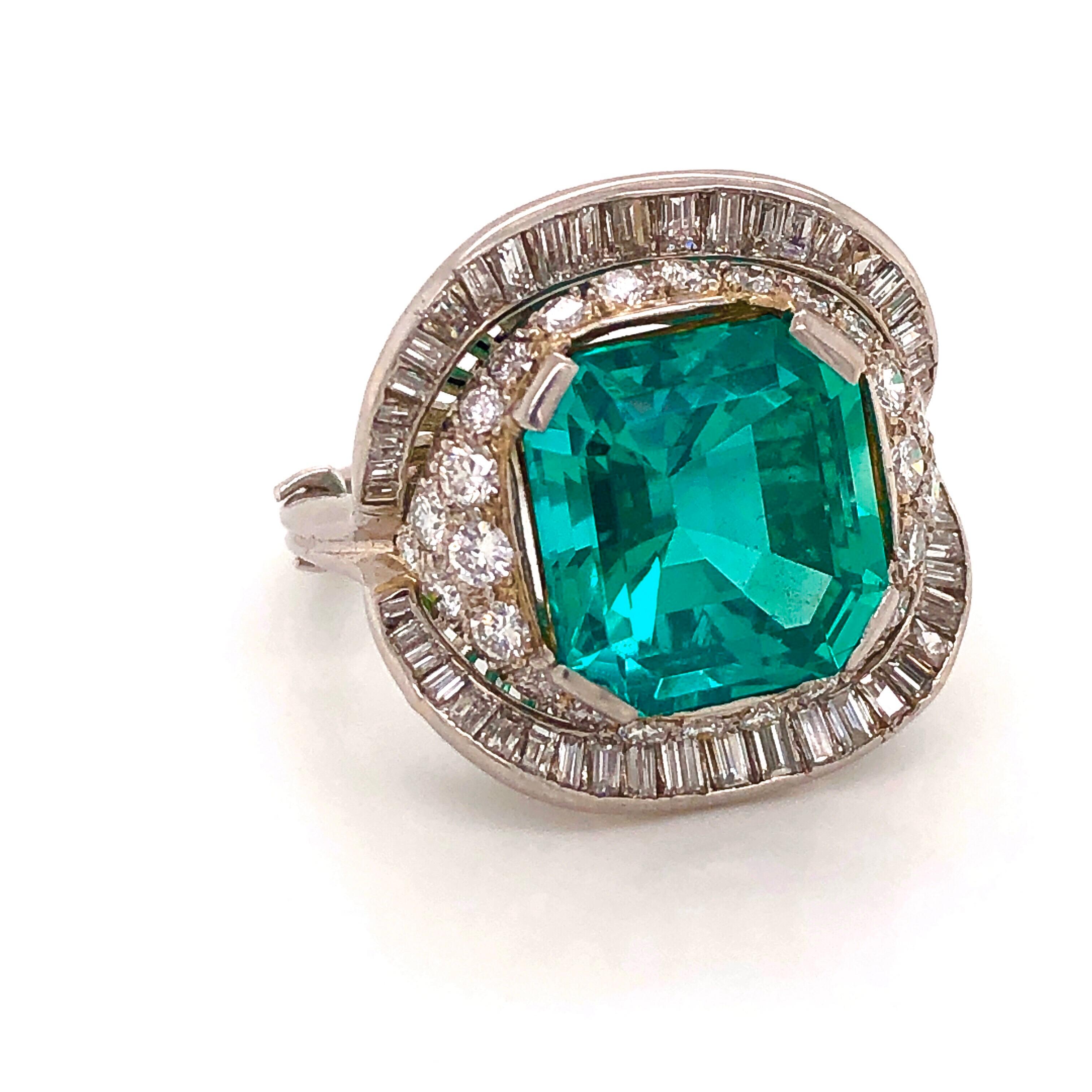 Featuring an octagon cut No oil & Untreated Colombian Emerald weighing over 7 Carats. With the diamonds the approx total weight of this ring is 9.08 carats. Emilio Jewelry specializes in Emeralds, and investment no oil pieces such as this one.