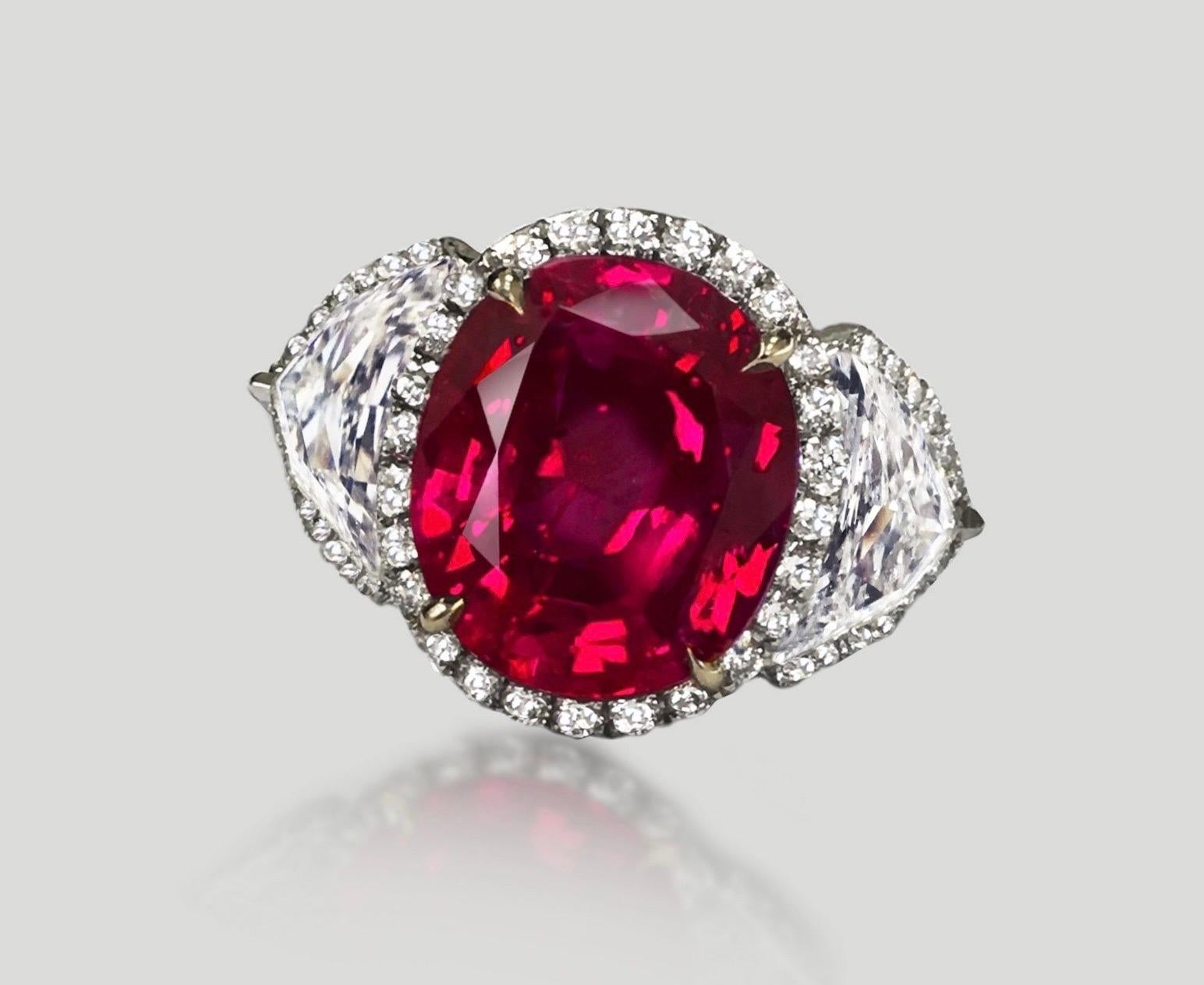 From the Museum Vault at Emilio Jewelry located on New York's iconic Fifth Avenue,
Featuring a breathtaking Royal Ruby center. 
Origin: Burma 
Color: vibrant Red color 
Clarity: Eye clean excellent clarity 
Please inquire for multiple certificates