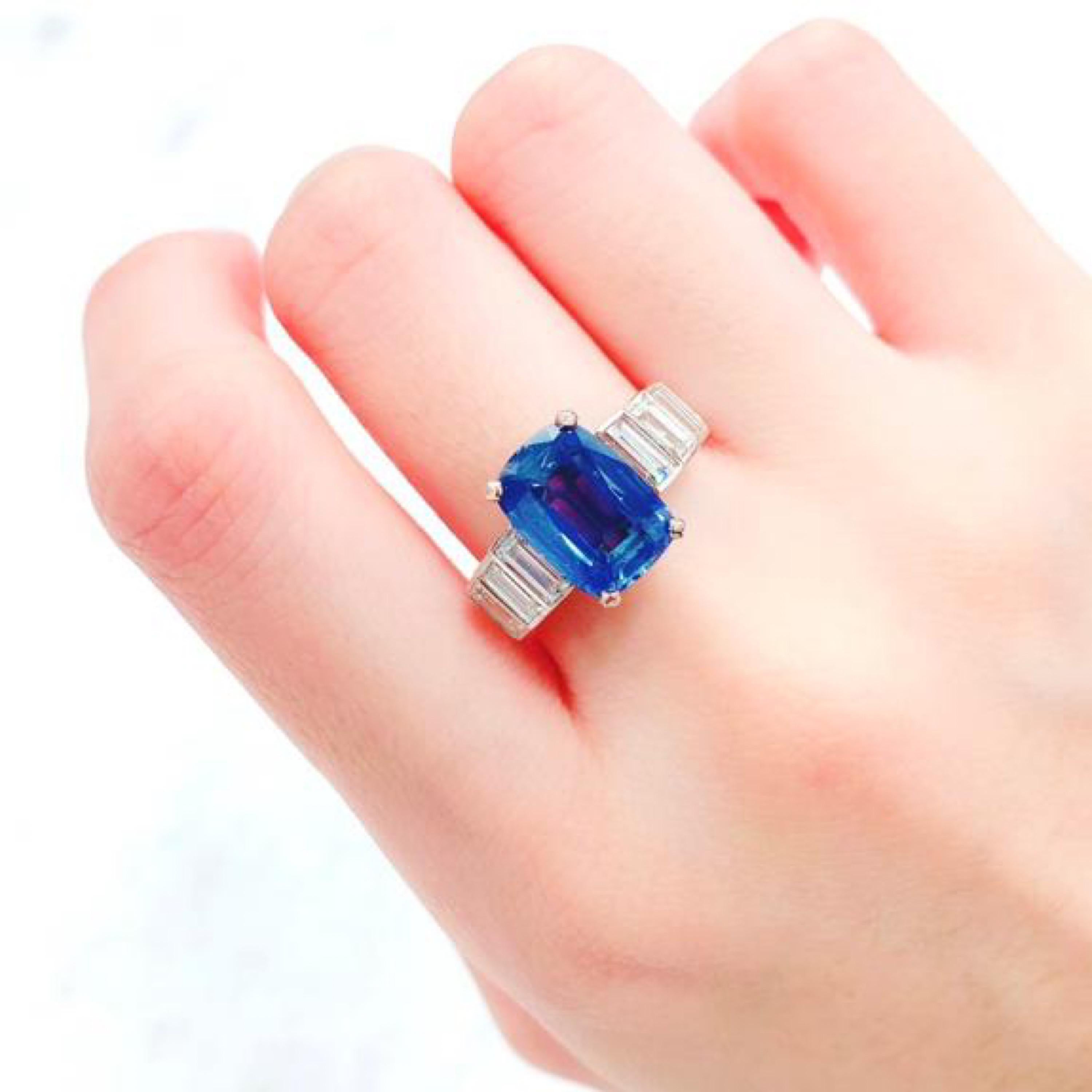 From Emilio Jewelry New York, a trusted and respected dealer located on New York's iconic Fifth Avenue.
Main stone: just under 5 carat center Kashmir Sapphire. Certified by Gueblin and Ssef.
Diamonds totaling about 1.49 carats 
Kashmir - the most