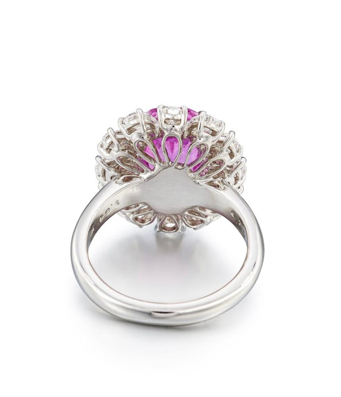 From Emilio Jewelry New York,
This exquisite untreated pink sapphire showcases a stunning array of soft, delicate hues, a spectacular stone indeed, it is a vibrant stone revealing the gem's exceptional clarity and brilliance. The sapphire is cut to