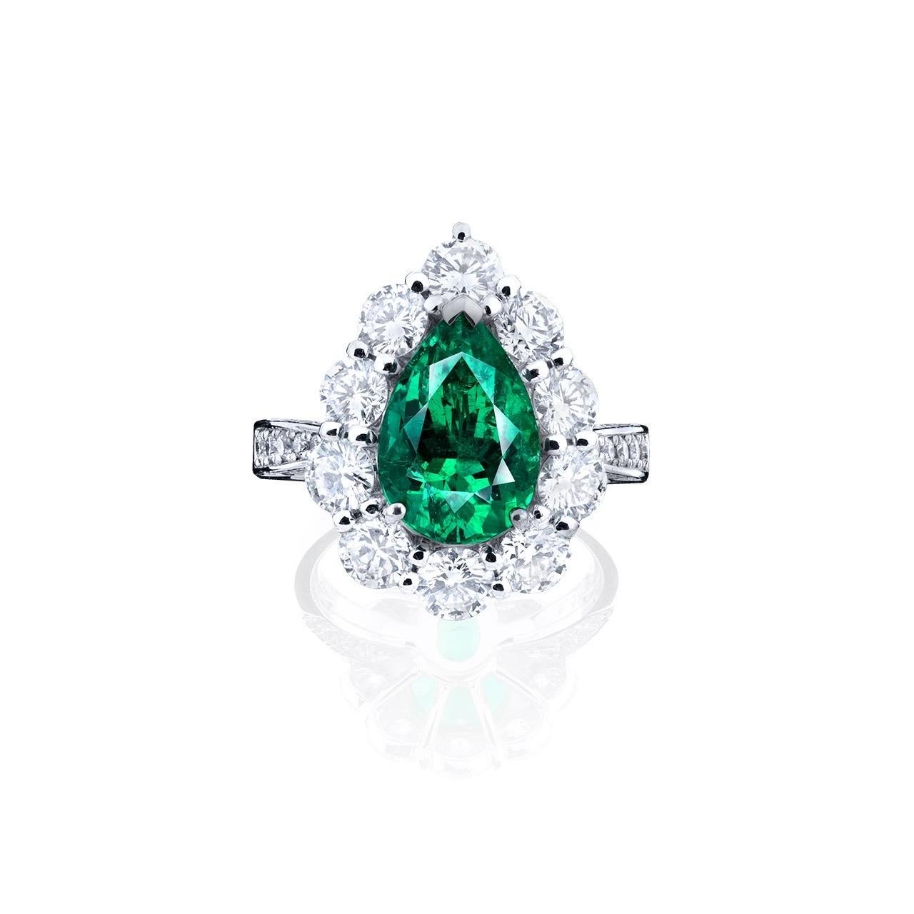Colombian no oil Main stone: 3.05 carat Vivid Green, Pear teardrop Emerald Untreated. 
Setting: White diamonds totaling approximately 2.62 carats
From Emilio Jewelry, a well known and respected wholesaler/dealer located on New York’s iconic Fifth