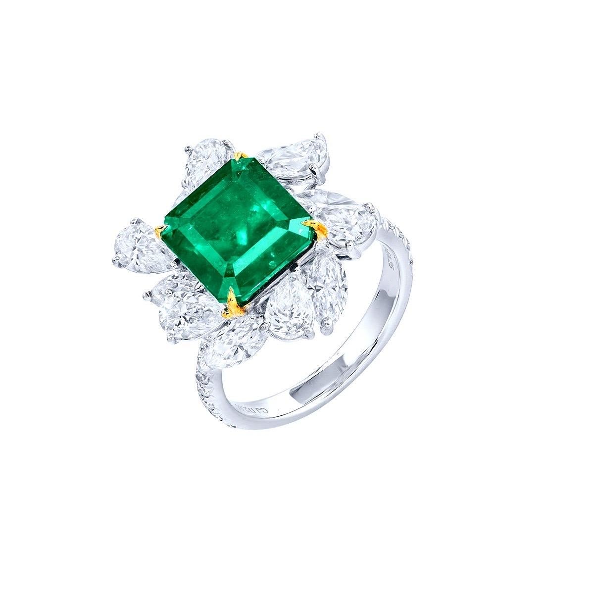 From the Museum Vault At Emilio Jewelry located on New York's iconic Fifth Avenue,
Center Stone: Gubelin certified as no oil untreated Colombian 4.25 carat Green OCTAGONAL
Setting: 6 fancy-cut white diamonds totaling about 1.70 carats, 6 fancy-cut