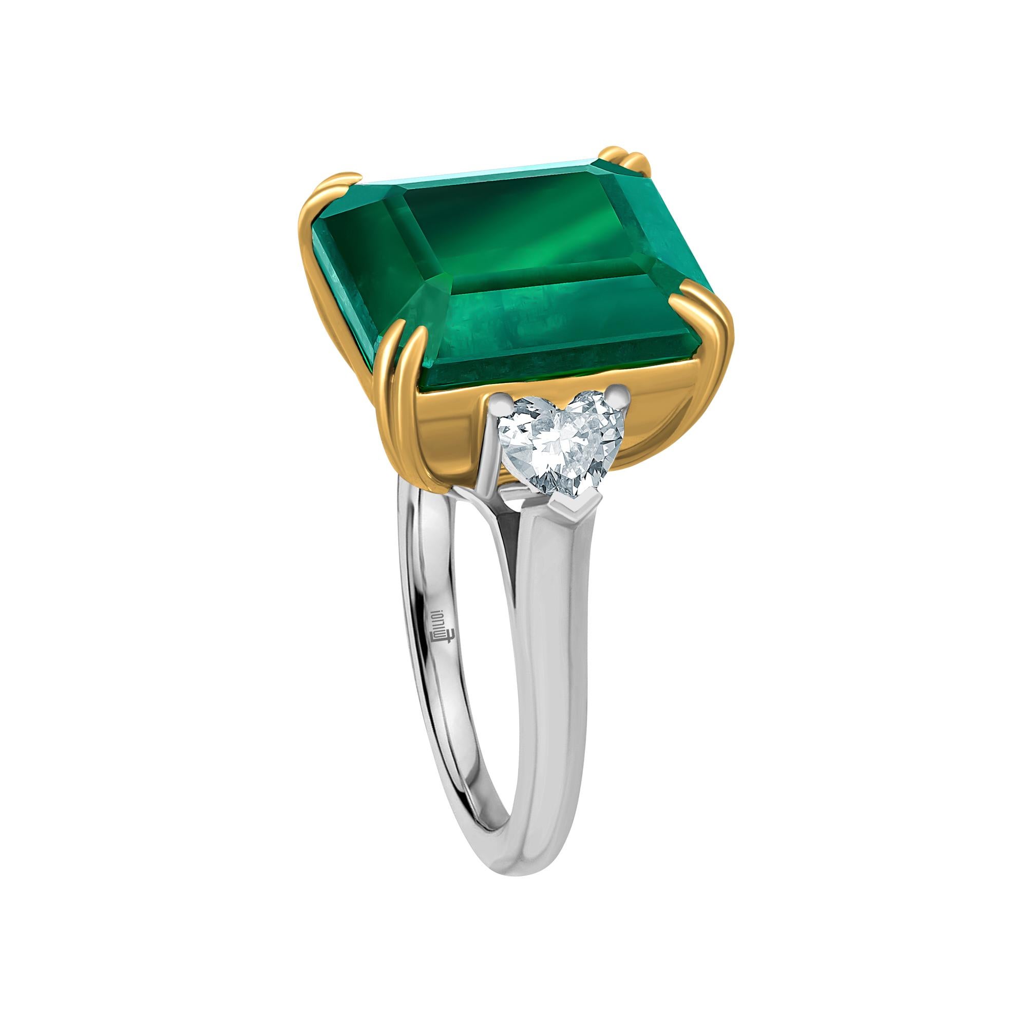 Showcasing a gorgeous Emerald cut Genuine Emerald Certified by C.Dunaigre. The emerald color is certified as Vivid green, the most desirable color in emeralds. The origin is certified as Zambian. Based on emerald grading methodology the clarity of