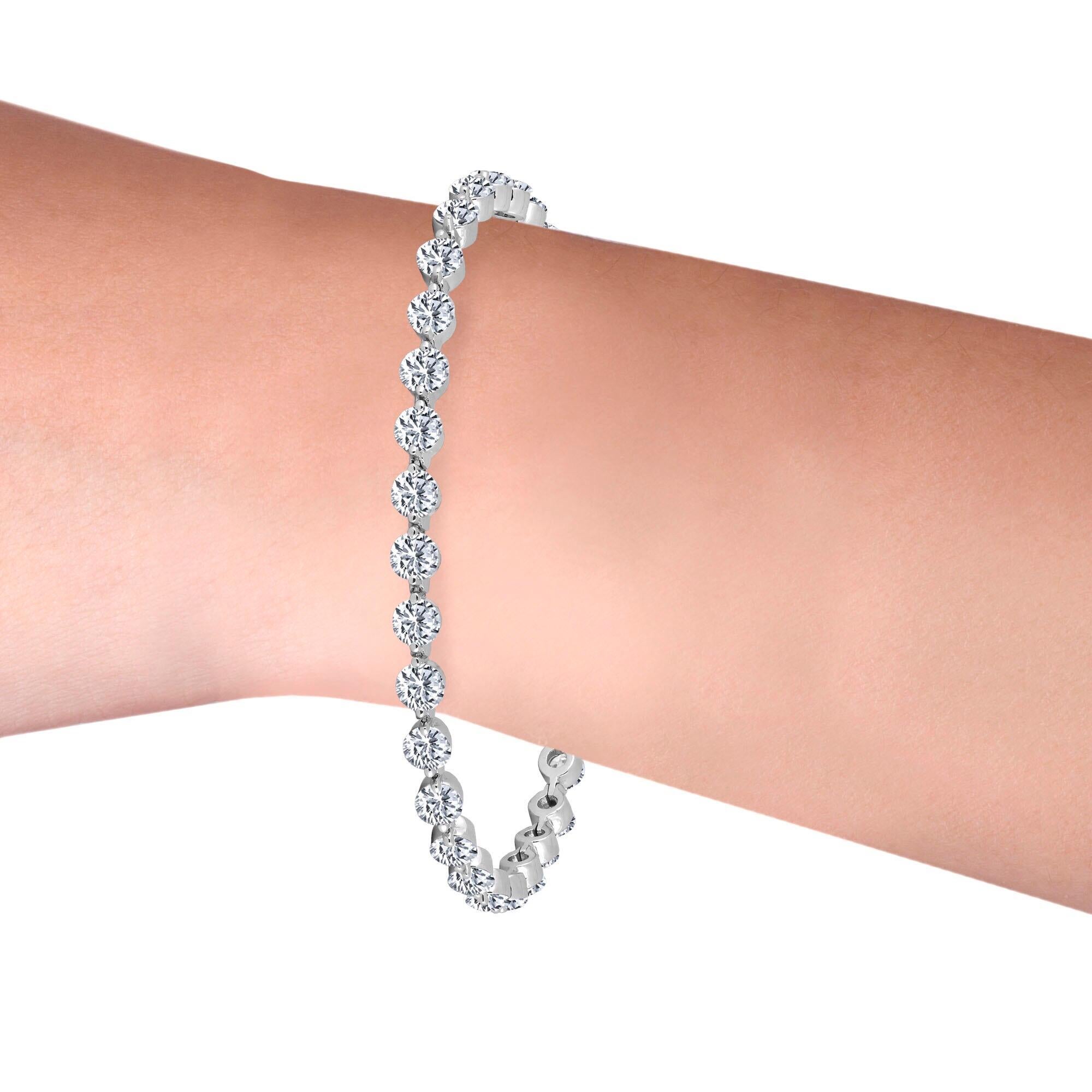 Approximately 30pt each diamond wow what an amazing hand bracelet indeed! The diamonds on our trademark bracelet look as if they are floating and if you want to see ALL DIAMOND and No metal this is the bracelet for you. Delicate, feminine, and