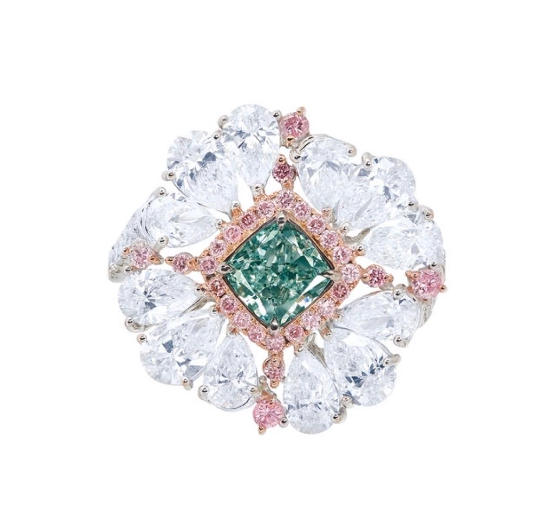 Showcasing a very special and rare 1 carat natural fancy green diamond ring certified by GIA. Hand made in the Emilio Jewelry Atelier, whom specializes in rare collectible pieces in the Natural ultra rare fancy colored Diamond sector.
Please inquire