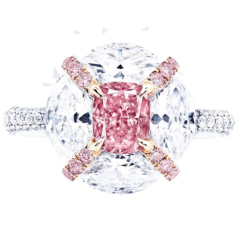 From the Emilio Jewelry Museum Vault, We are Showcasing a 1.00 carat natural fancy intense pink diamond in the center. This is indeed a straight intense pink.
This piece was Hand made in the Emilio Jewelry Atelier, whom specializes in rare
