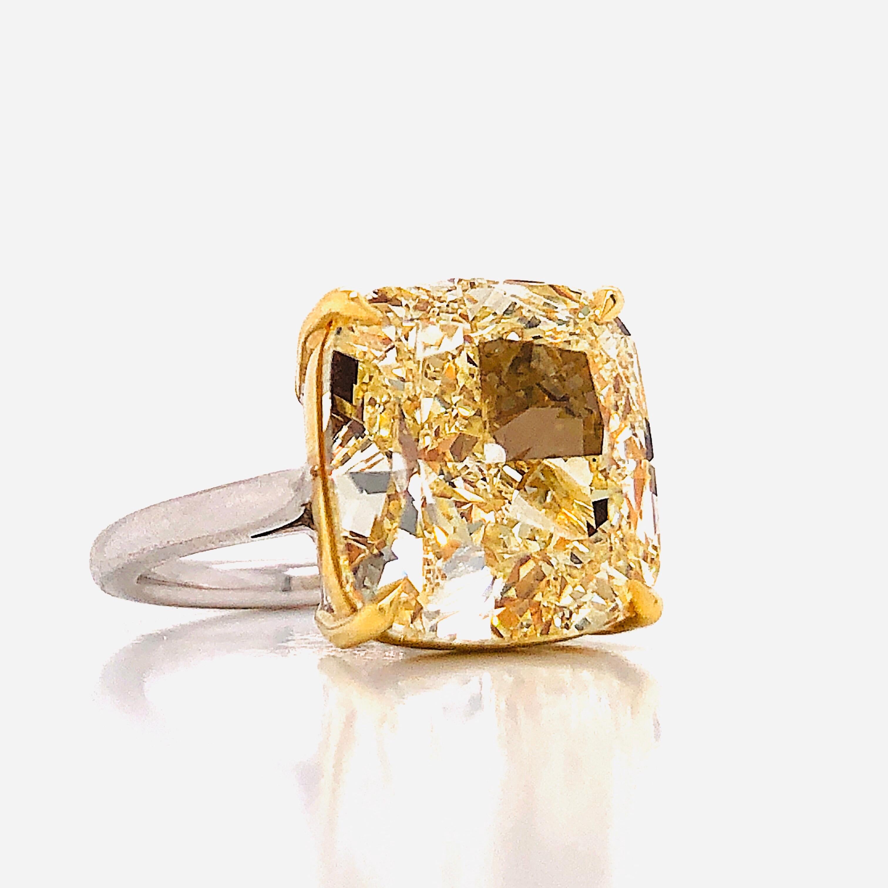 Showcasing a spectacular GIA certified 12 Carat Natural fancy yellow diamonds with excellent saturation throughout. The clarity is Vs2 with and an exceptionally clean diamond. Simply send us a message to request a copy of the GIA report.
Ring