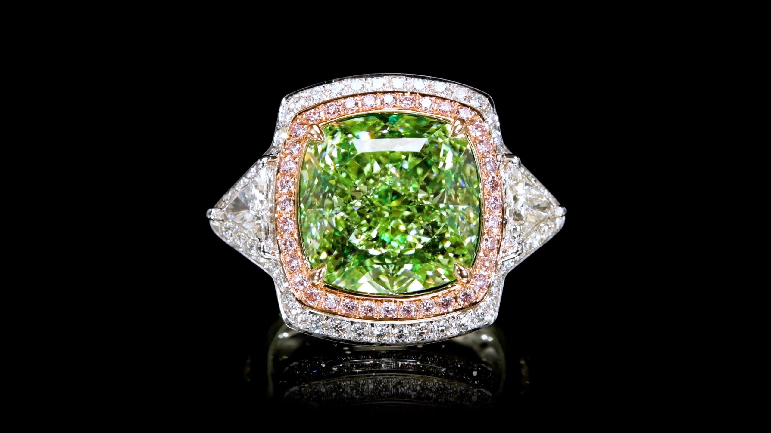 From Emilio Jewelry New York, a well known and respected dealer located on New York's iconic Fifth Avenue,

Our specialty are one of a kind jewels, and Natural Fancy Color diamonds are our favorite! 

The focal point of this magnificent ring is the