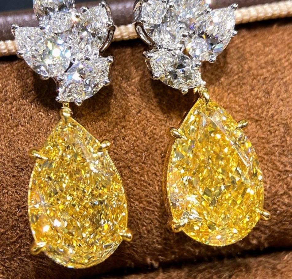 From Emilio Jewelry, a well known and respected wholesaler/dealer located in the Iconic Gem Tower/Gia Building in New York's Diamond District.

Featuring two Gia certified natural pear shape center diamonds, both weighing over 7.00 carats each