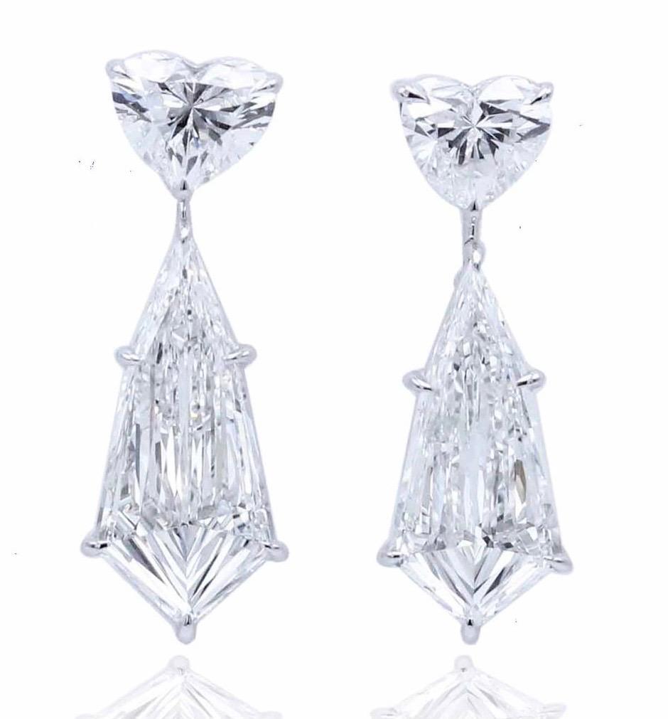 From The Museum Vault At Emilio Jewelry New York,
The most spectacular and unique pair of earrings that exists! Filled with tremendous fire, sparkle and dance the center diamonds are a dream for whoever will own it. Rarely do we have the opportunity