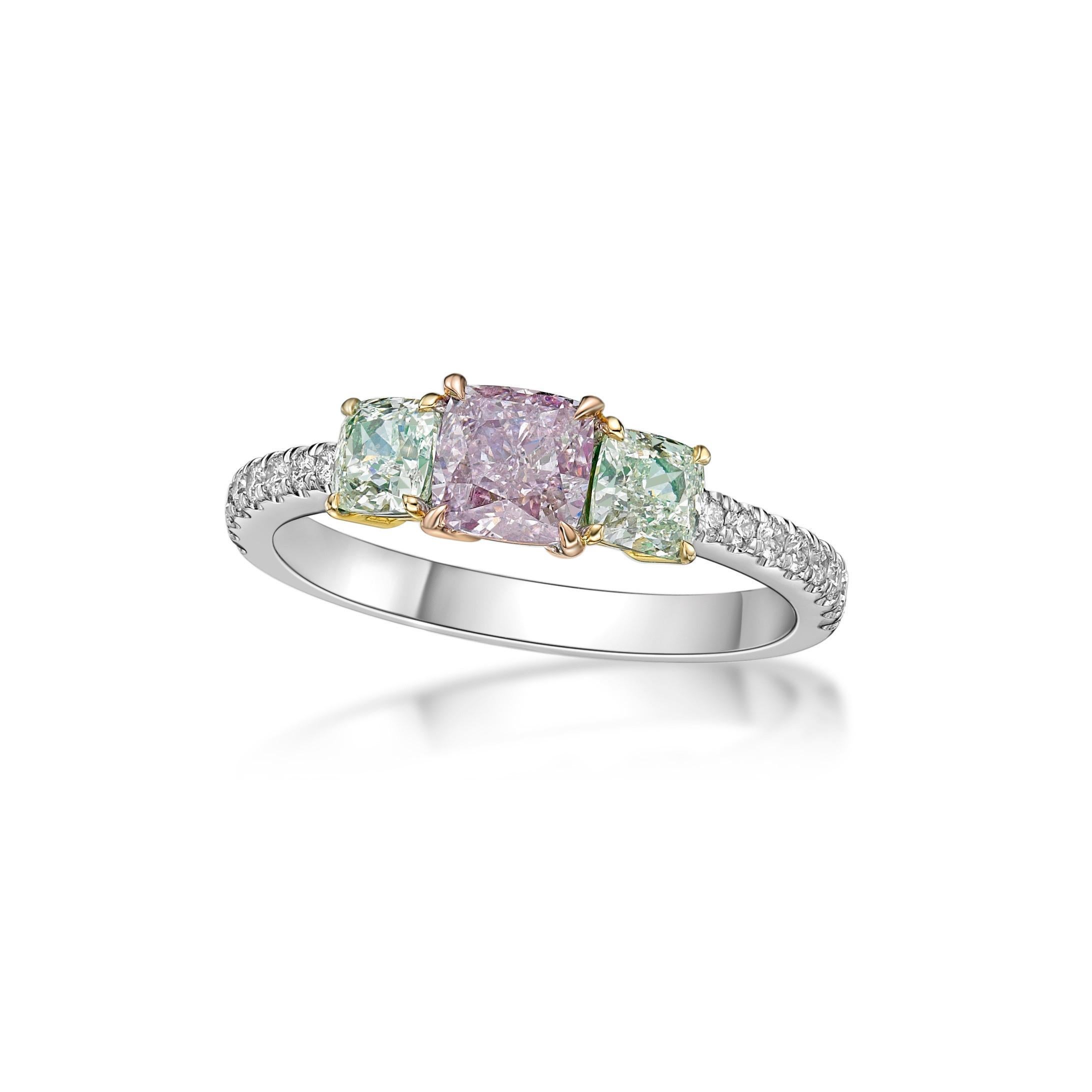 3 Center diamonds total 1.40ct
16 diamonds total 0.19ct

From The Museum Vault at Emilio Jewelry Located on New York's iconic Fifth Avenue,
Showcasing a very special and rare Gia certified natural pink purple diamond and green in center. Total