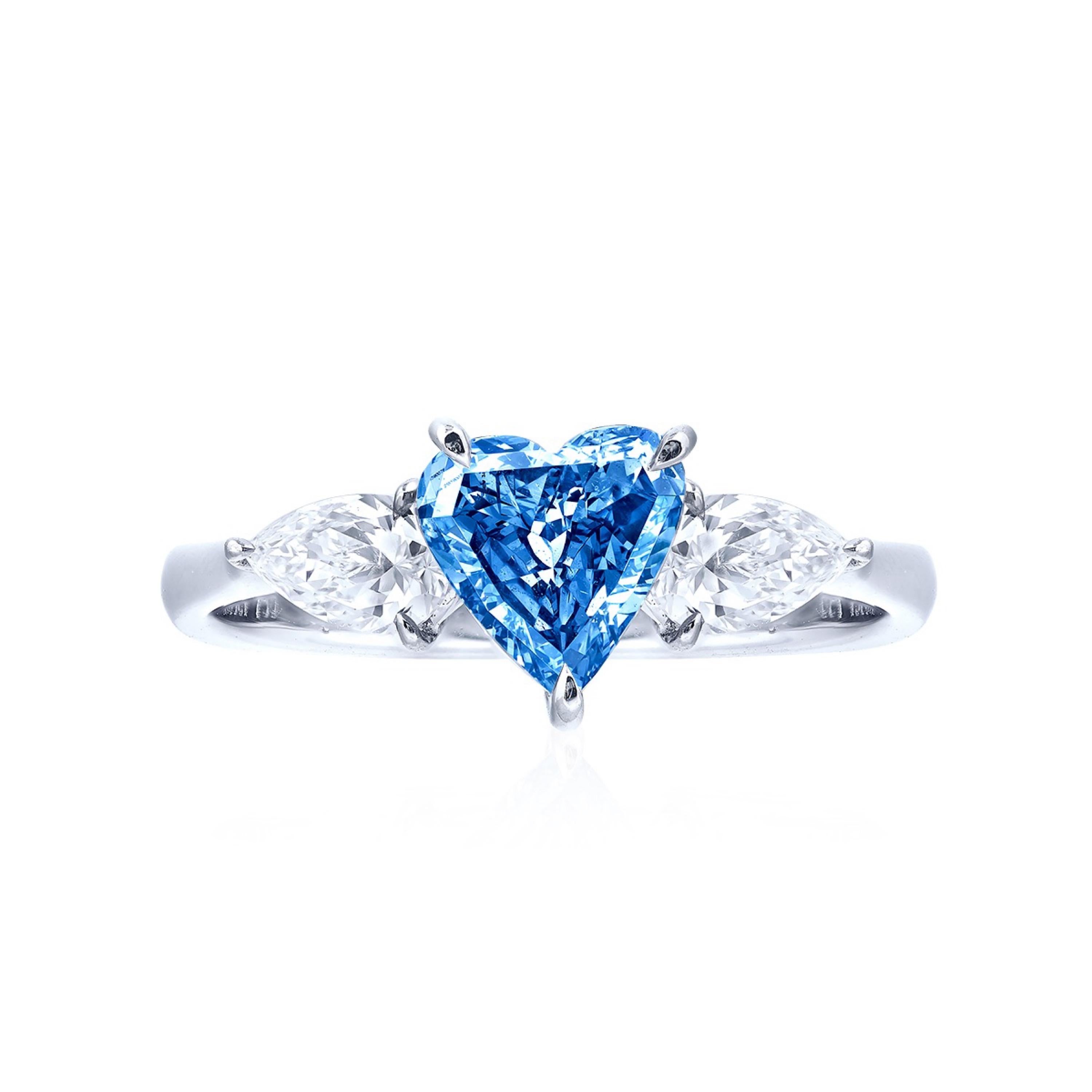 Center Stone: Gia certified natural  1.00 carat Fancy Vivid Blue Heart 
Matching setting: 2 fancy lace white diamonds, a total of about 0.60 carats, 
From the Museum vault at Emilio Jewelry, Located On New York’s Iconic Fifth Avenue:
If you have