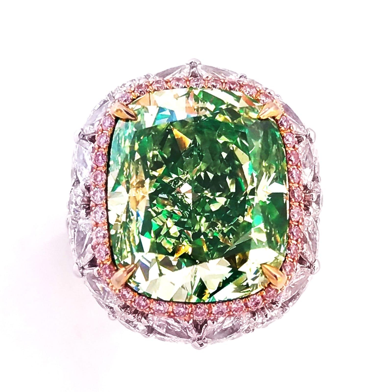 Showcasing a Gia certified 16.50 carat natural fancy green yellow diamond, this diamond is really special because of its size. Green diamonds are super rare, and this ring is just spectacular! 
This piece was Hand made in the Emilio Jewelry Atelier,