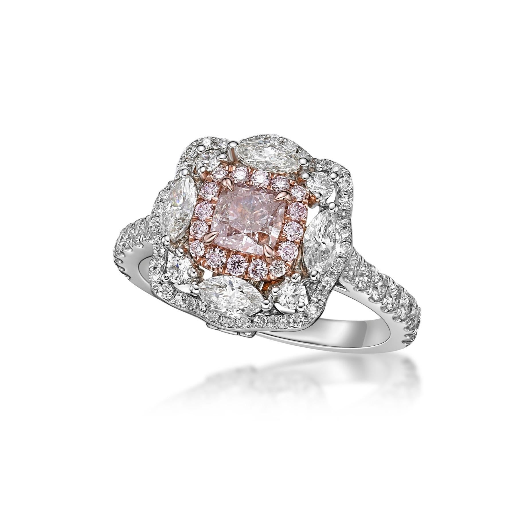 Center: Gia natural fancy pink .55ct
4 marquise .52
additional .76ct diamonds 
From The Vault at Emilio Jewelry Located on New York's iconic Fifth Avenue,
Showcasing a very special and rare Gia certified natural pink diamond set in the center .55ct