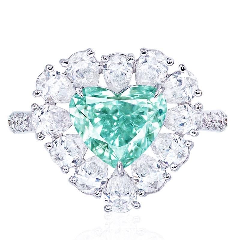 From the Museum Vault at Emilio Jewelry New York,
Main stone: Gia certified natural 2.10ct+ carat Fancy Intense Blue-Green heart shape diamond. 
Setting: White diamonds total approximately 1.52 carats, white diamonds total approximately 0.22 carats,