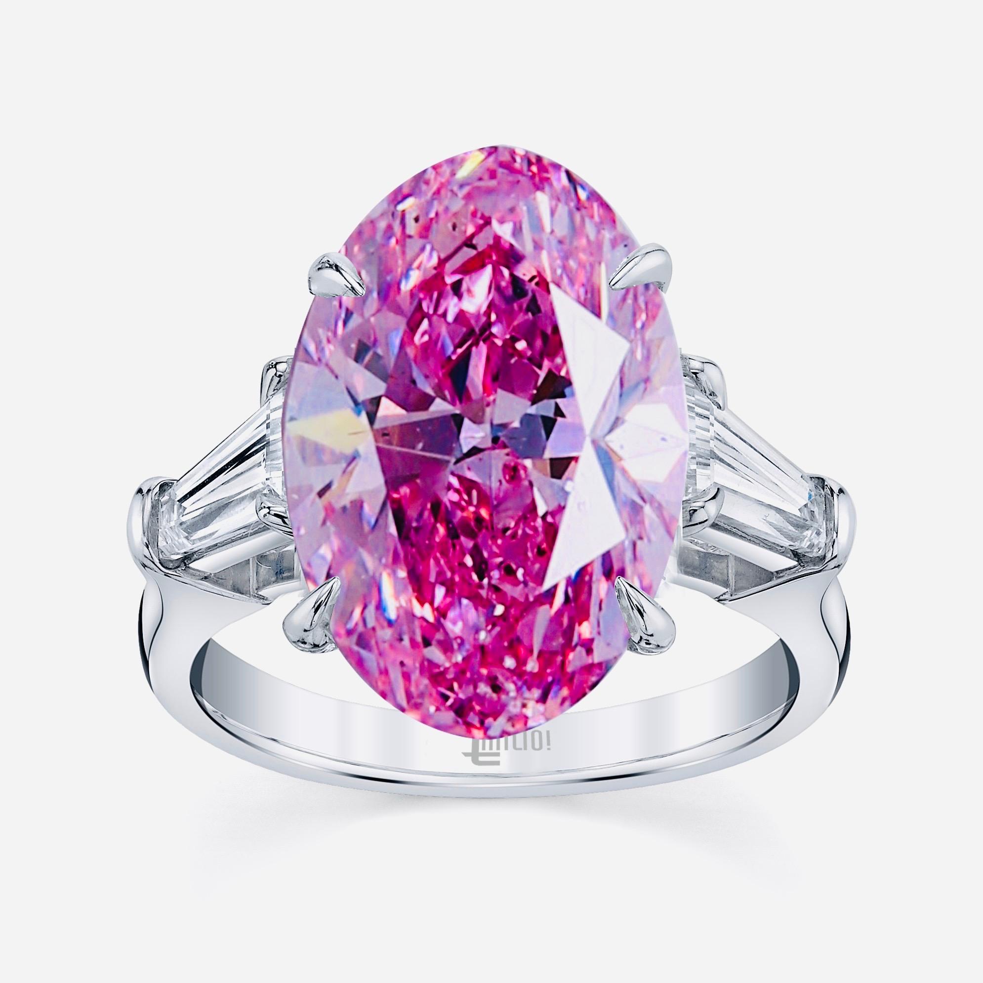 From The Museum Vault At Emilio Jewelry Located on New York's Fifth Avenue,
A true collection piece. Sits in the center a magnificent elongated oval. Gia certified as a natural vivid purplish pink this diamond is really one of kind because it has