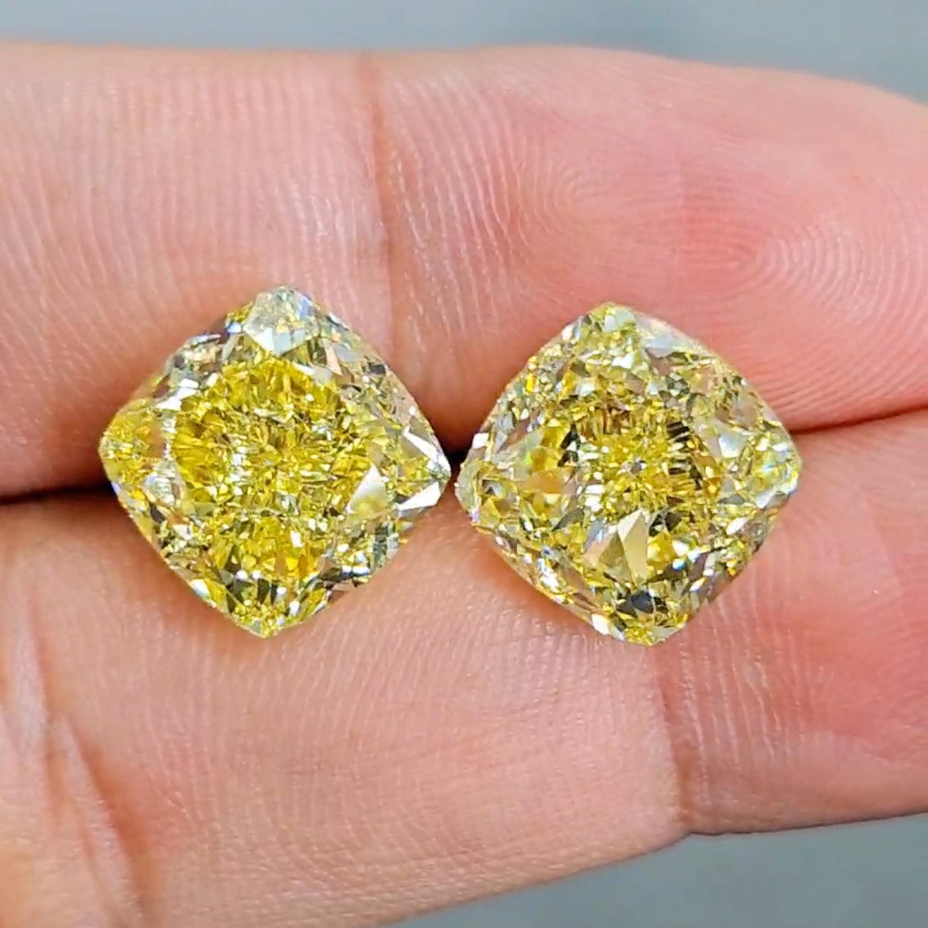 From Emilio Jewelry, a well known and respected wholesaler/dealer located on New York’s iconic Fifth Avenue, 
Mind blowing perfect matching pair of Gia Certified Natural Fancy Intense Yellow Diamonds weighing over 10.00 carats each and 20 carats