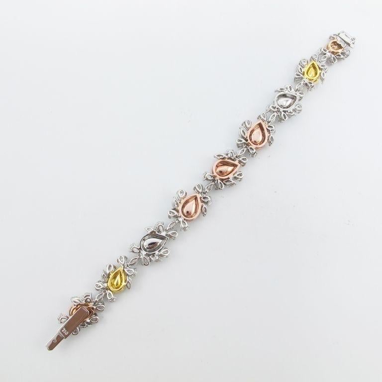 From Emilio Jewelry, a well known and respected wholesaler/dealer located on New York’s iconic Fifth Avenue, 
A bracelet sure to increase in value over time. Set with Gia Certified natural Pink, Green, Blue, and Yellow Diamonds totaling over 21.60