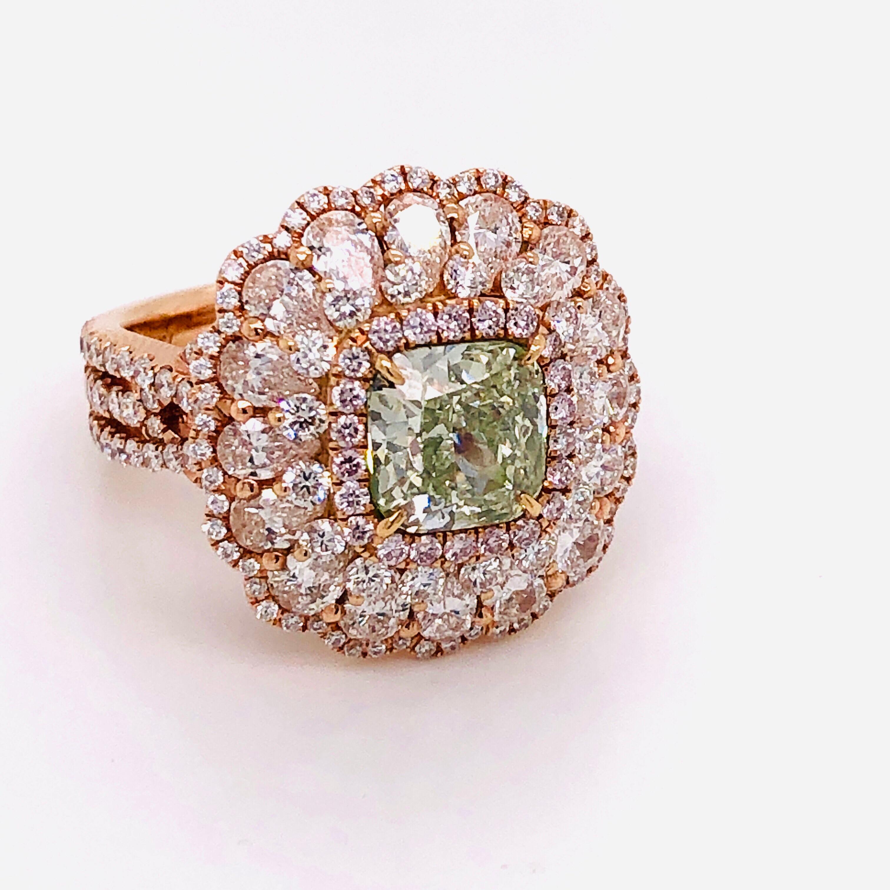 Hand made in the Emilio Atelier Showcasing a spectacular GIA certified 2.18ct Natural fancy green diamond with excellent saturation throughout. The clarity is Vs2. Please send us a message to request a copy of the GIA report. This design features a