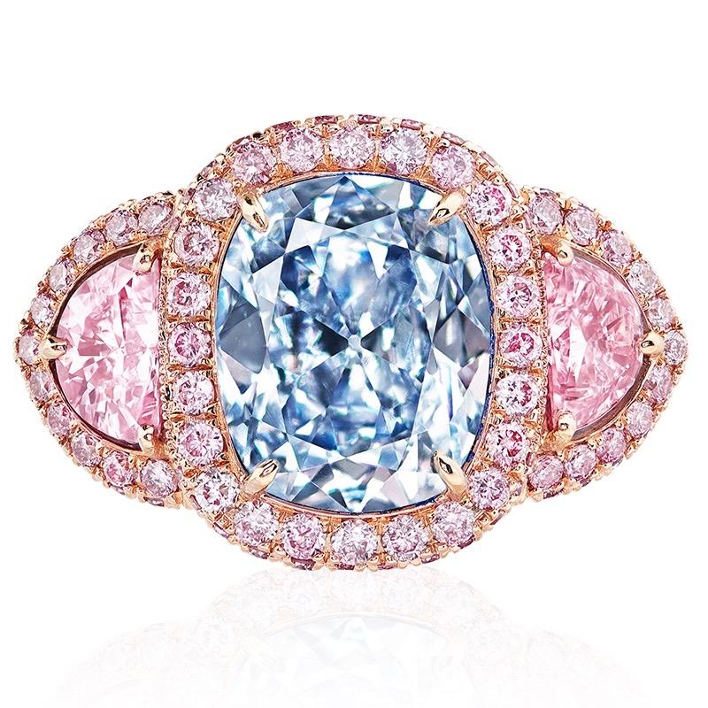 From the Museum Vault at Emilio Jewelry New York, 
Main stone: 2.50 carats Gia certified natural Fancy Light pure Blue Diamond with no overtone. Please inquire for details. 
Setting: white diamonds totaling about 1.04 carats, pink diamonds totaling