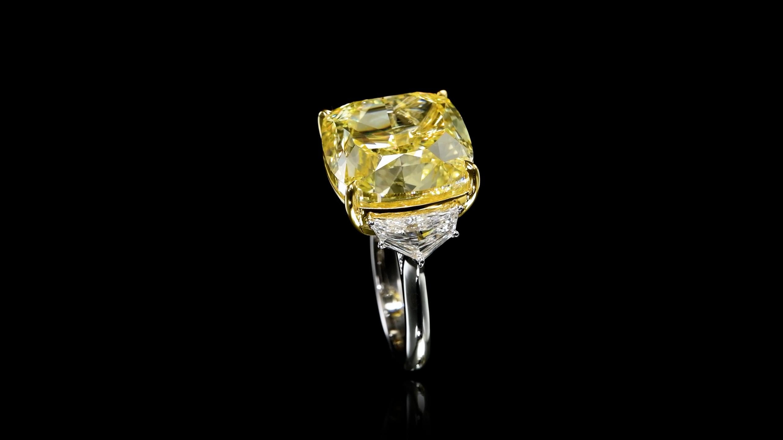 Von Emilio Jewelry, einem bekannten und angesehenen Großhändler mit Sitz auf der berühmten Fifth Avenue in New York, 
Mit einem der seltensten natürlichen gelben Diamanten auf dem Markt. Gia-zertifiziert Fancy Intense Yellow Diamond, lupenreine