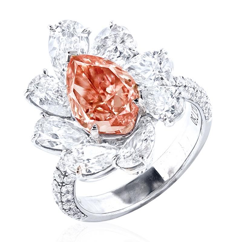 From the Emilio Jewelry Museum Vault,
Main stone: 3.00 carats Fancy Intense Orangy Pink VS2 PEAR
Setting: 74 white diamonds with a total of about 0.77 carats, 8 white diamonds with a total of about 3.149 carats, 18K
From a historical perspective,