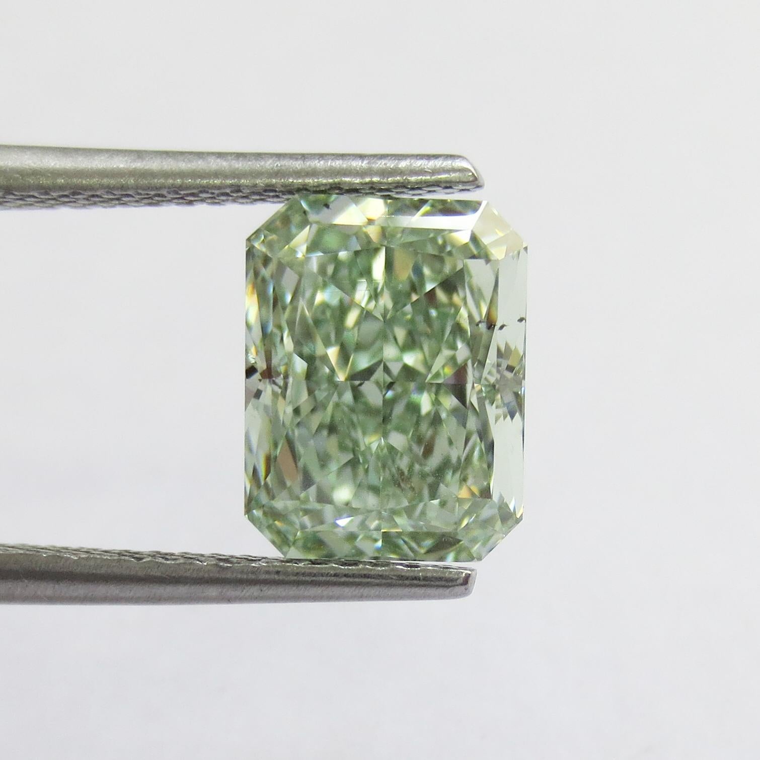 From the Emilio Jewelry Museum Vault, Showcasing a magnificent investment grade natural 3.00 carat fancy intense yellowish green diamond. Yellowish means the overtone is very slight and 90% green. 
We are experts at creating jewels for these very