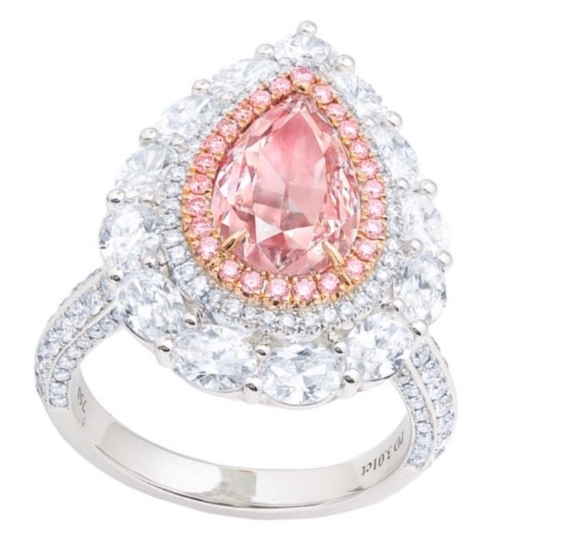 Showcasing a 3 carat GIA Fancy light pink natural diamond.Hand made in the Emilio Jewelry Atelier, whom specializes in rare collectible pieces in the fancy color diamond field.
Please inquire for more images, the certificate, diamond weights, or