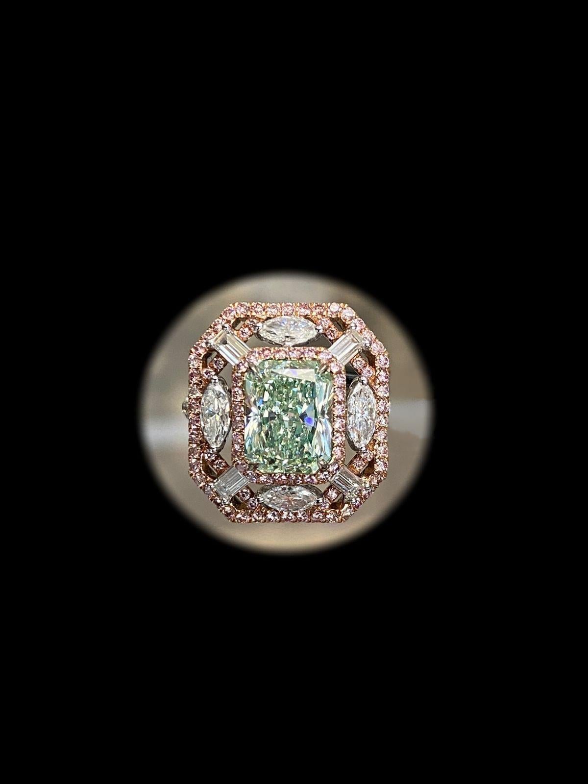 From the Emilio Jewelry Museum Vault, Showcasing a stunning Gia certified 3.00 carat natural fancy yellowish green diamond set in the center. As opposed to yellow green, yellowish means it has only about a 10% yellow overtone (yellow green would be