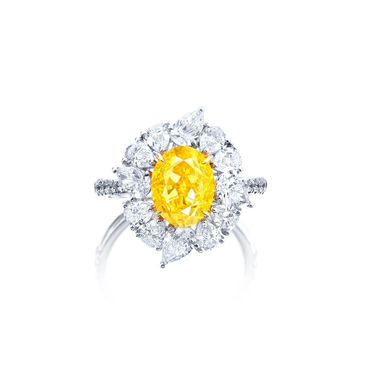 From well known dealer and wholesaler Emilio Jewelry New York, located on New York's iconic Fifth Avenue..
Center Stone: 3.00 ct Fancy Vivid Yellow OVAL Internally Flawless! 	
setting: 12 white diamonds totaling approximately 2.10 carats, 38 white