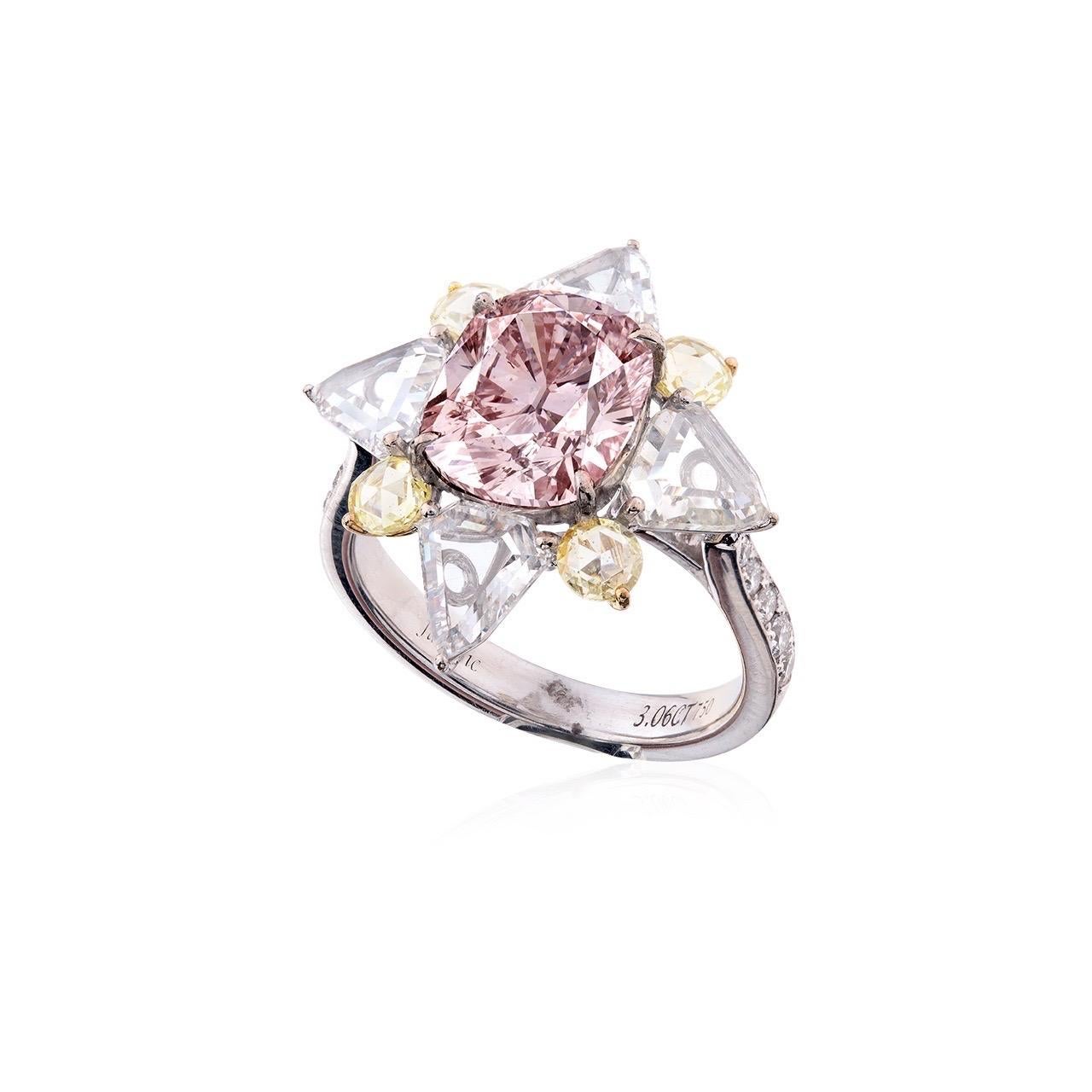 Main stone: 3.21 carat Light Pink, SI2, Cushion

From Emilio Jewelry, a well known and respected wholesaler/dealer located on New York’s iconic Fifth Avenue, 
Perfect ring for someone who is looking for a natural pink diamond of substantial size!