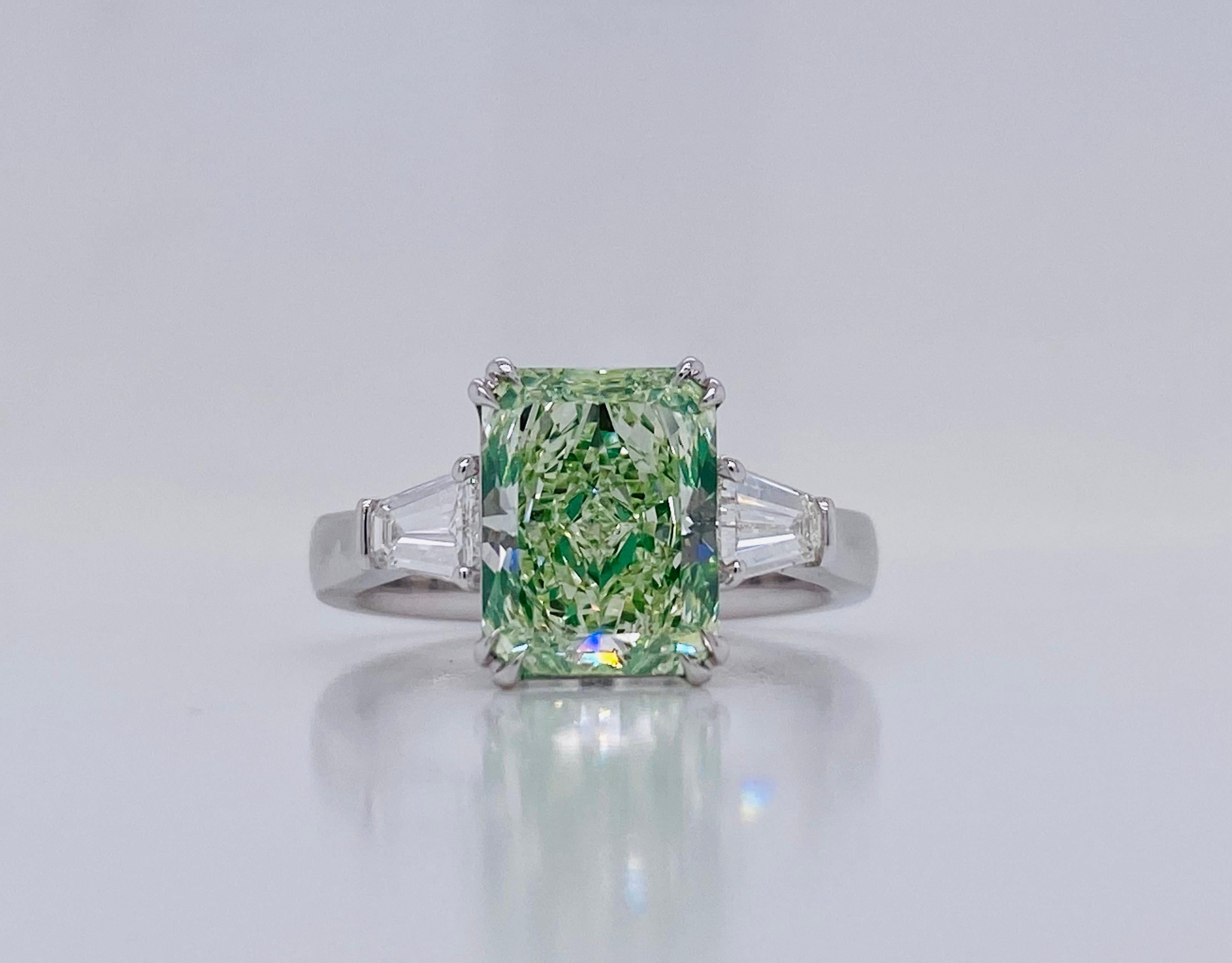 From the museum vault at Emilio Jewelry New York,
Another masterpiece from our natural fancy green diamond collection. There are very few jewelers who really know how to bring out the color of such diamonds. Please inquire for certificate, diamonds