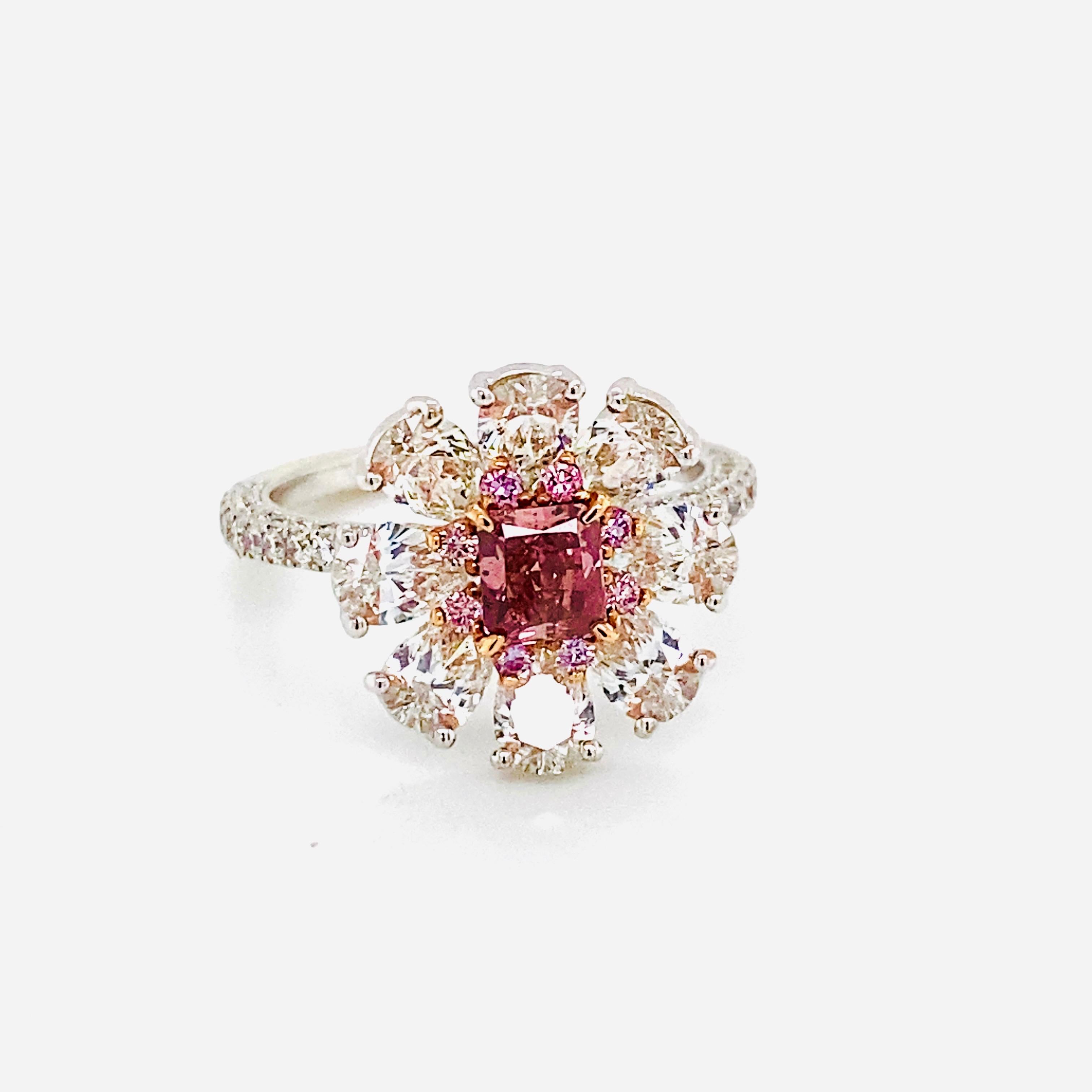 From The Museum Vault At Emilio Jewelry New York,
The rarest color in the diamond spectrum, a natural fancy red diamond center with no overtone! Avid passionate collectors are always on the search for natural red diamonds of any size. The center