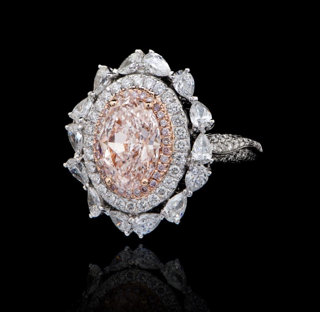 From The Museum Vault at Emilio Jewelry Located on New York's iconic Fifth Avenue,
Inquire for detailed video! 
Showcasing a very special and rare Gia certified natural fancy very light pink diamond ring. We specialize in creating special mountings