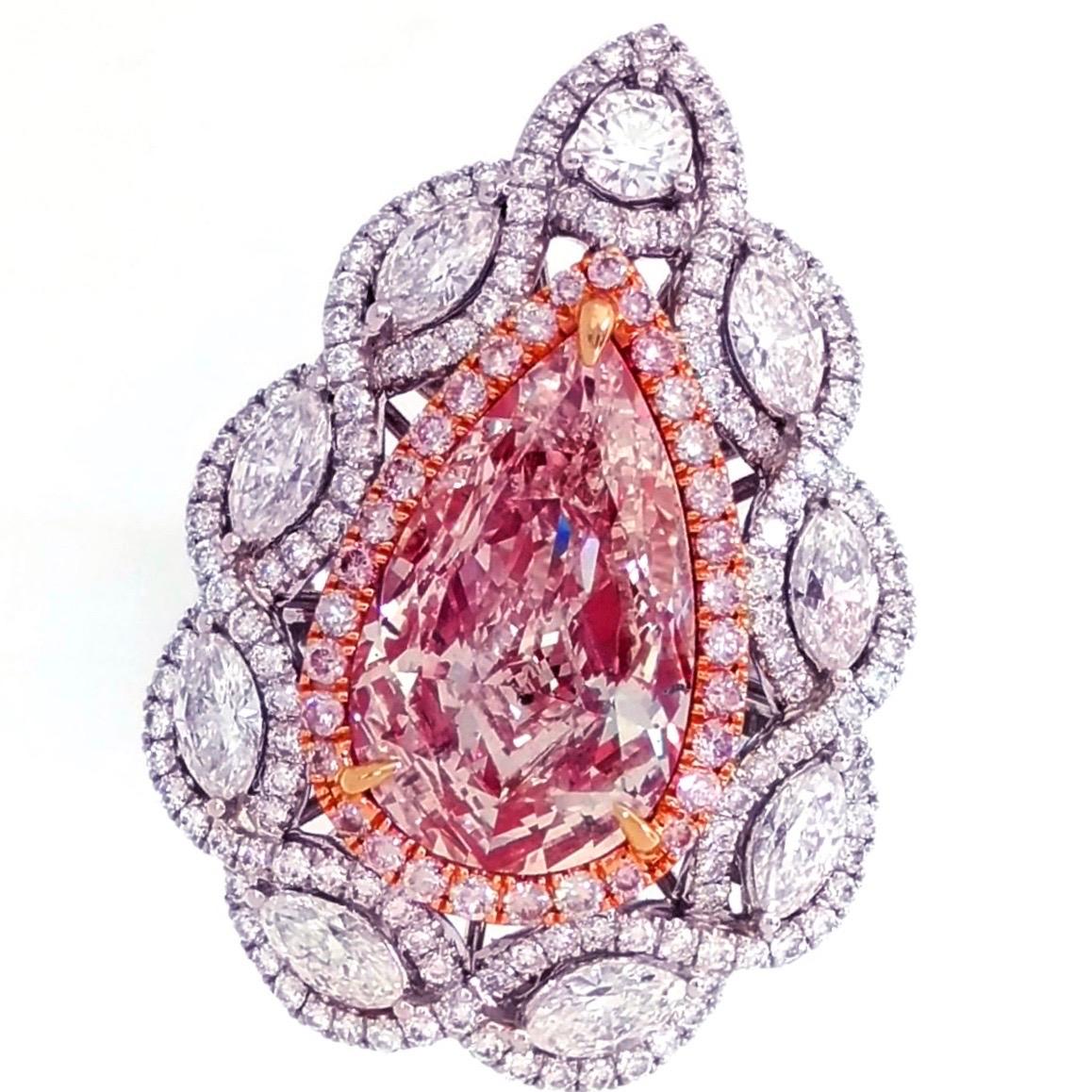From the Emilio Jewelry Vault, We are Showcasing a Gia certified 4 carat+ natural fancy brownish pink diamond in the center.
This piece was Hand made in the Emilio Jewelry Atelier, whom specializes in rare collectible pieces in natural Fancy colored