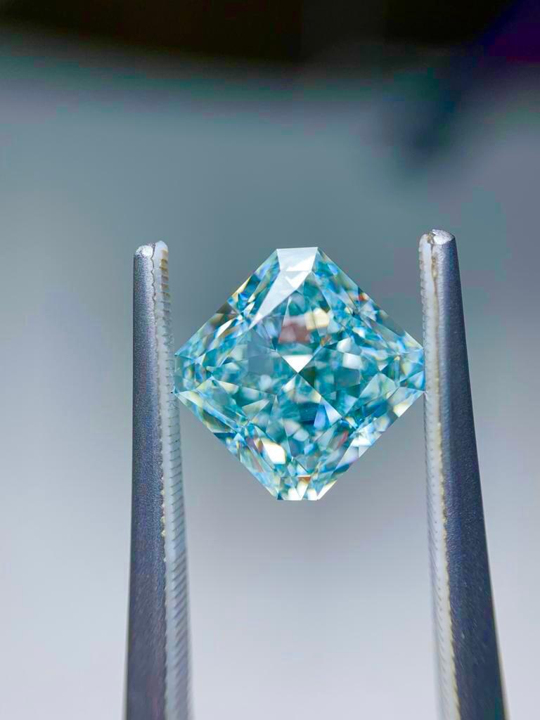 From the Emilio Jewelry Museum Vault, Showcasing a magnificent investment grade 4.00 carat natural fancy blue diamond with greenish overtone. Emilio's expertise after setting this stone in an Emilio Atelier it will face up with as a fancy vivid blue