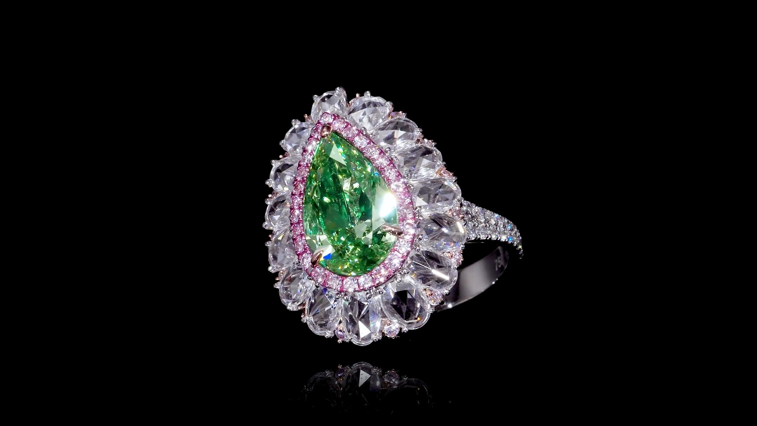 From the Museum Vault At Emilio Jewelry New York, another very special piece for the passionate collector,
Featuring a very special Gia certified natural fancy greenish yellow diamond set in the center weighing just over 4 carats. After set in the