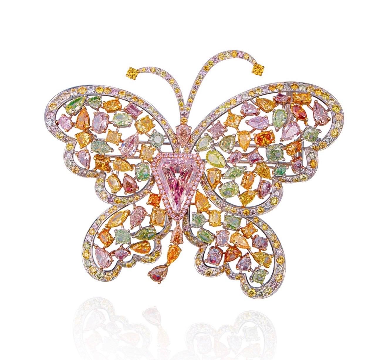 From The Museum Vault at Emilio Jewelry Located on New York's iconic Fifth Avenue,
Showcasing a very special and rare butterfly brooch hand made by Emilio Artisans, specializing in bringing out the maximum potential of each and every natural fancy