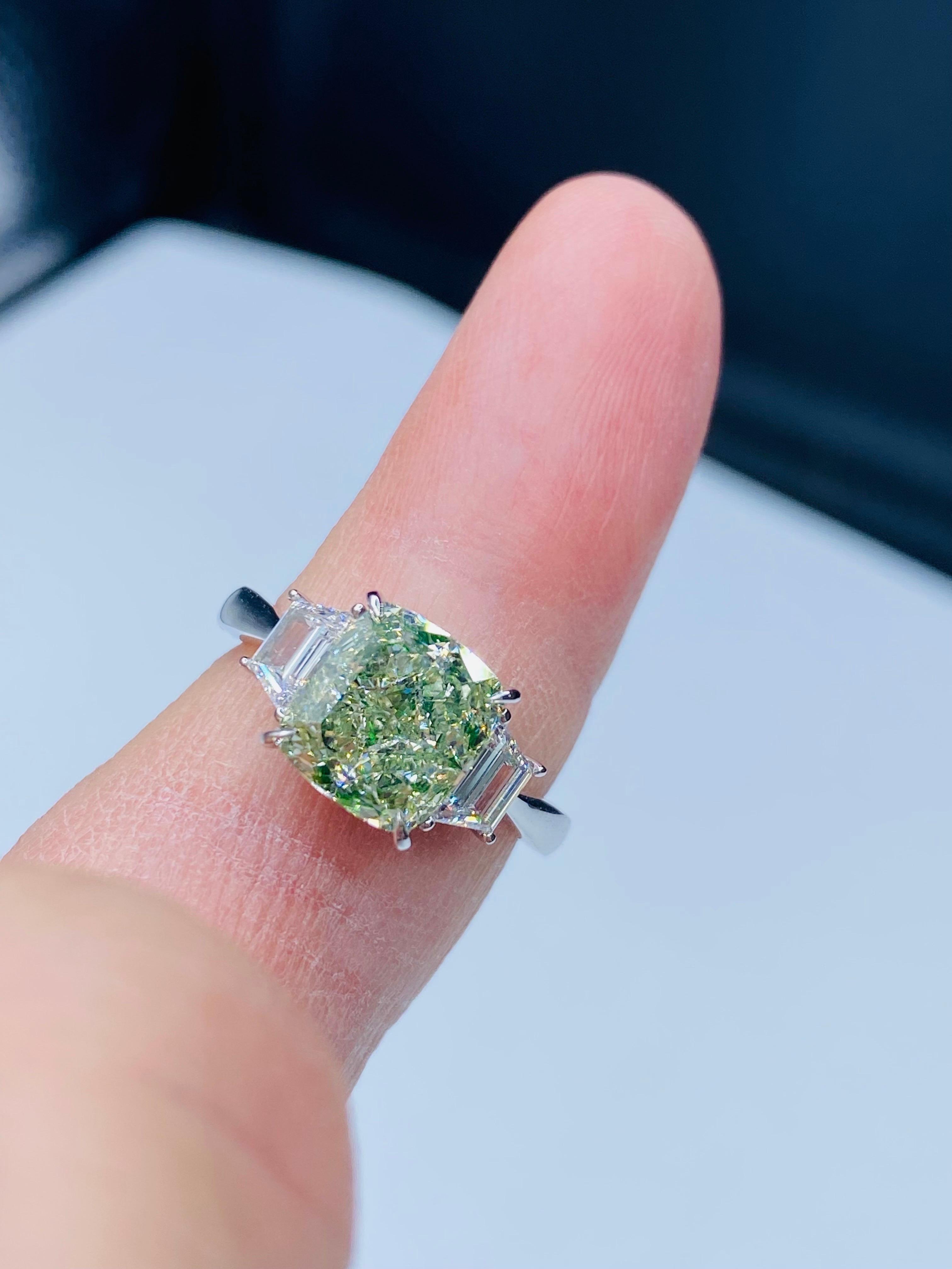 From Well known and respected dealer Emilio Jewelry New York,

This exquisite rare green diamond is Gia Certified Natural Fancy Green Diamond with a yellow overtone , however the primary color is green according to Gia. Certified as Fancy Yellow